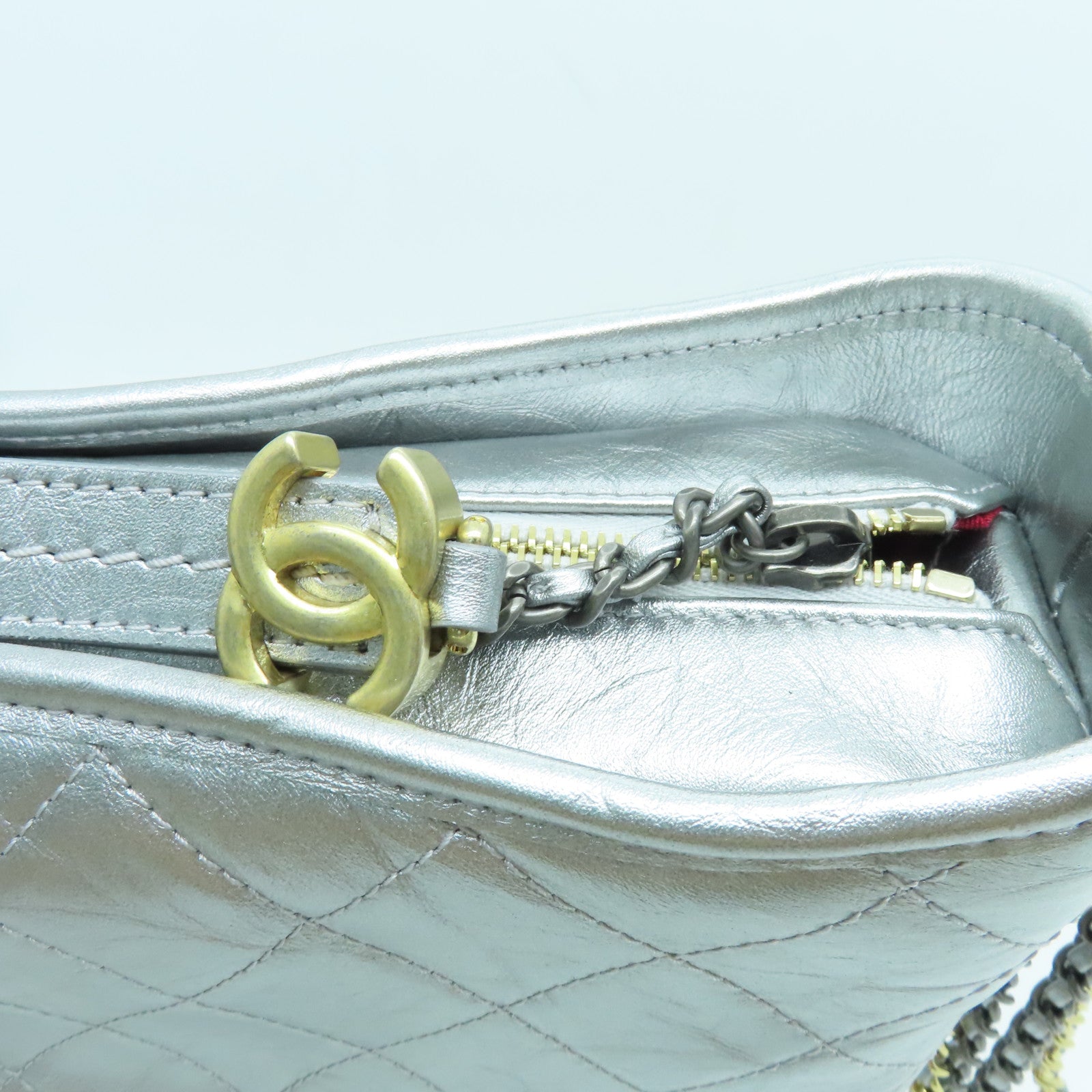 CHANEL cowhide leather Gabrielle gold and silver buckle shoulder bag silver