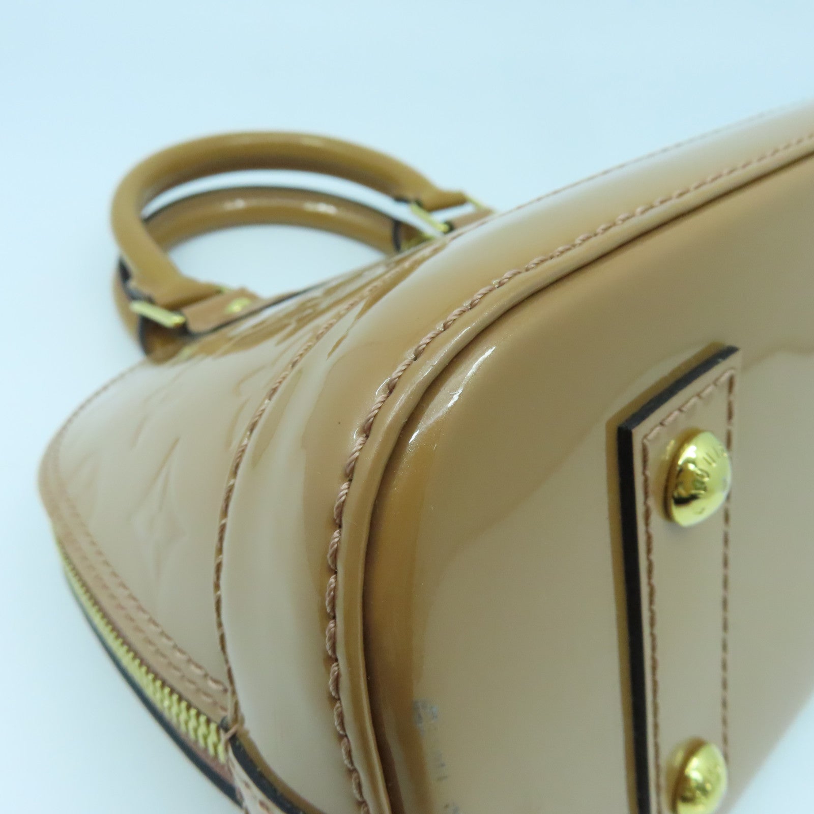 LOUIS VUITTON Monogram Vernis Alma BB金扣手挽袋棕色
