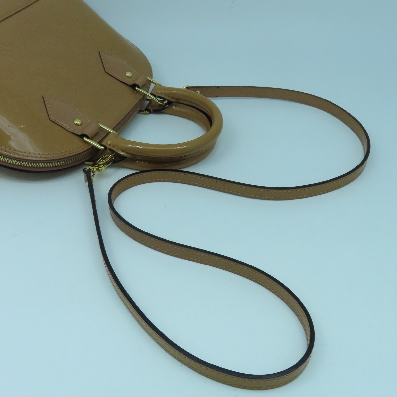 LOUIS VUITTON Monogram Vernis Alma BB金扣手挽袋棕色