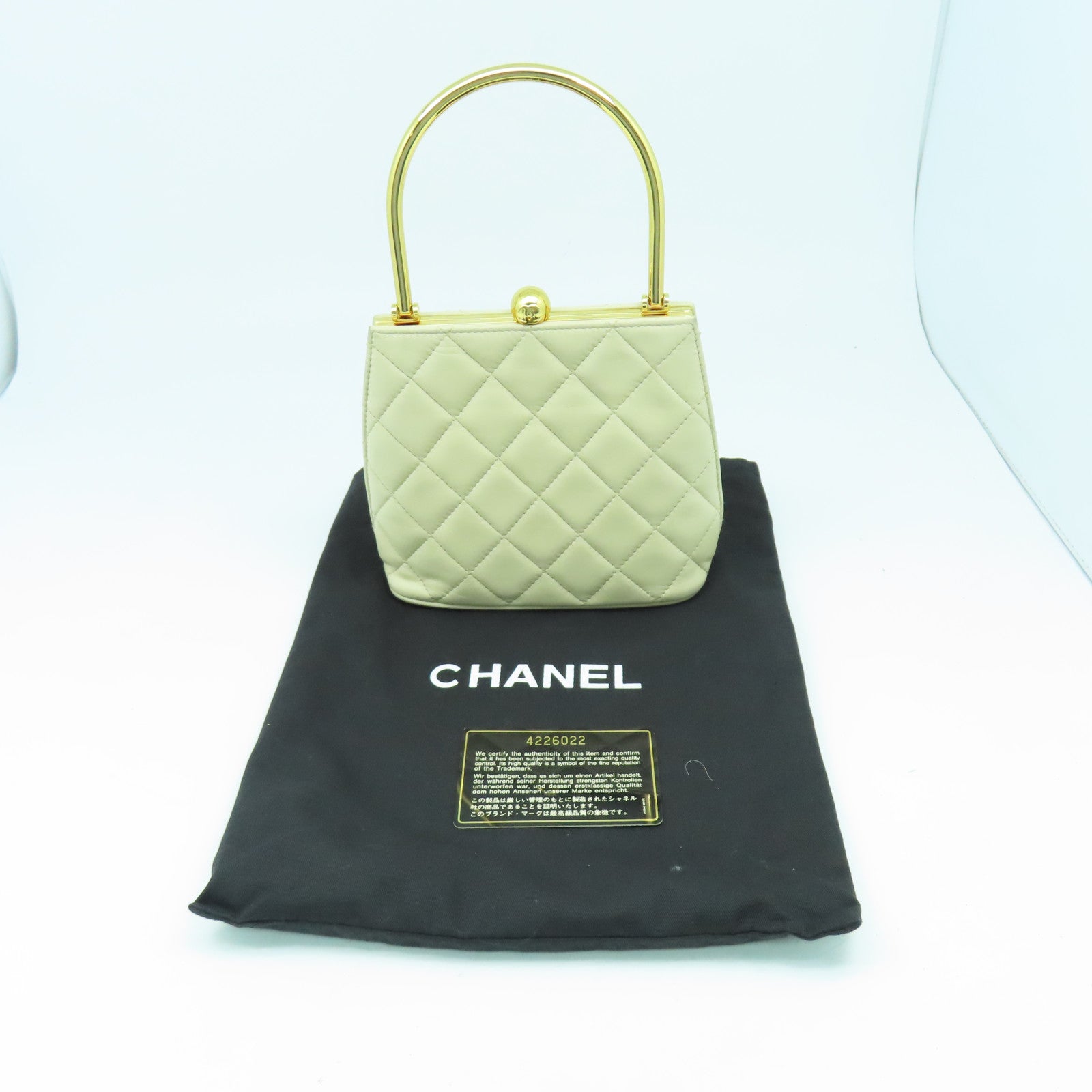 CHANEL 菱格牛皮皮革Handbag金扣手挽袋米色