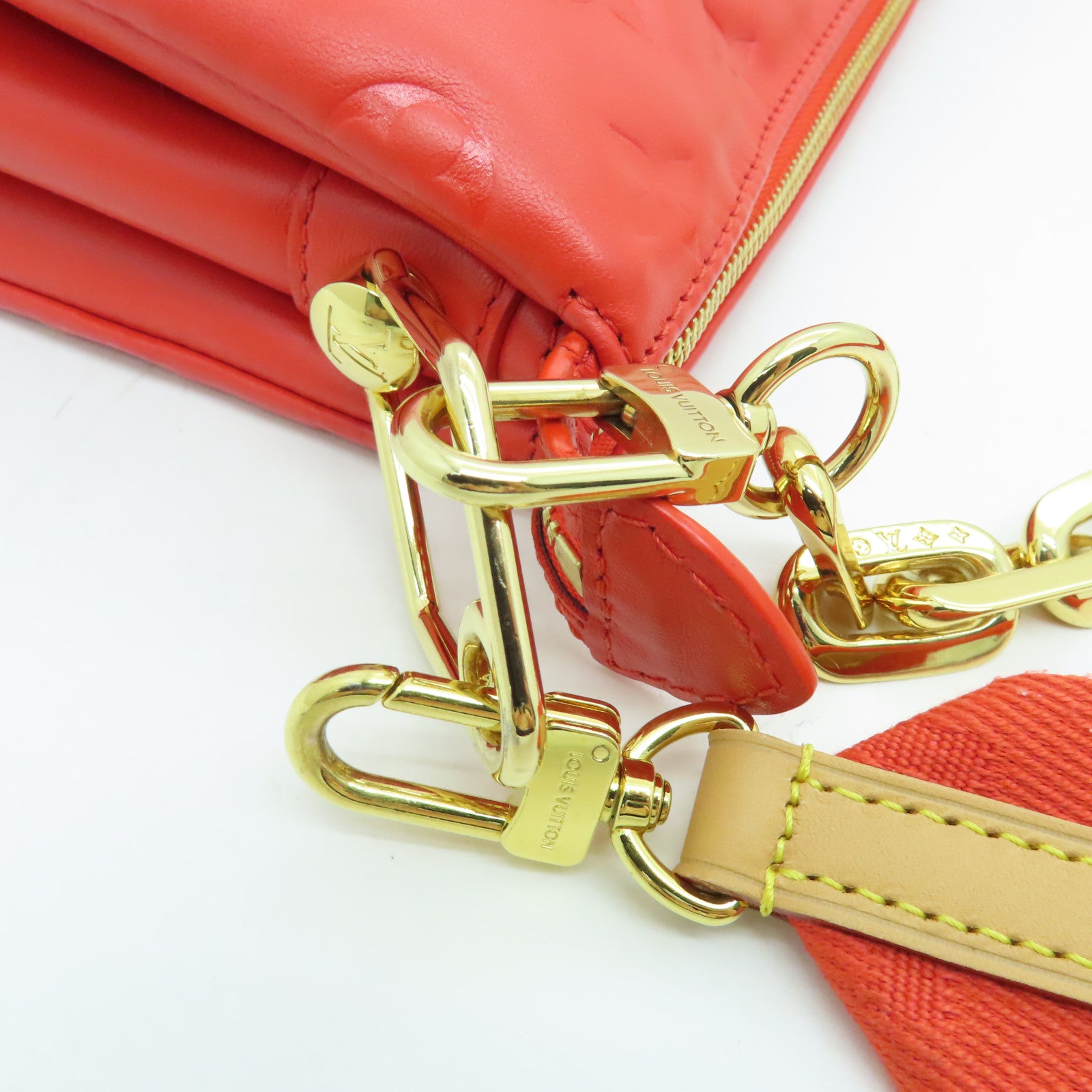 LOUIS VUITTON Monogram Embossed Coussin PM gold buckle handle shoulder bag red