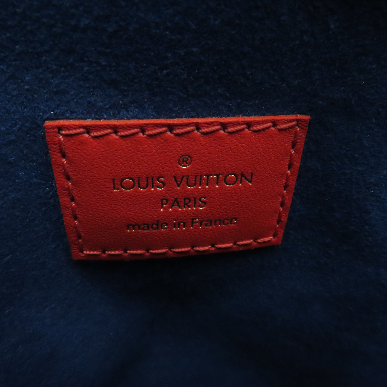 LOUIS VUITTON Monogram Embossed Coussin PM gold buckle handle shoulder bag red