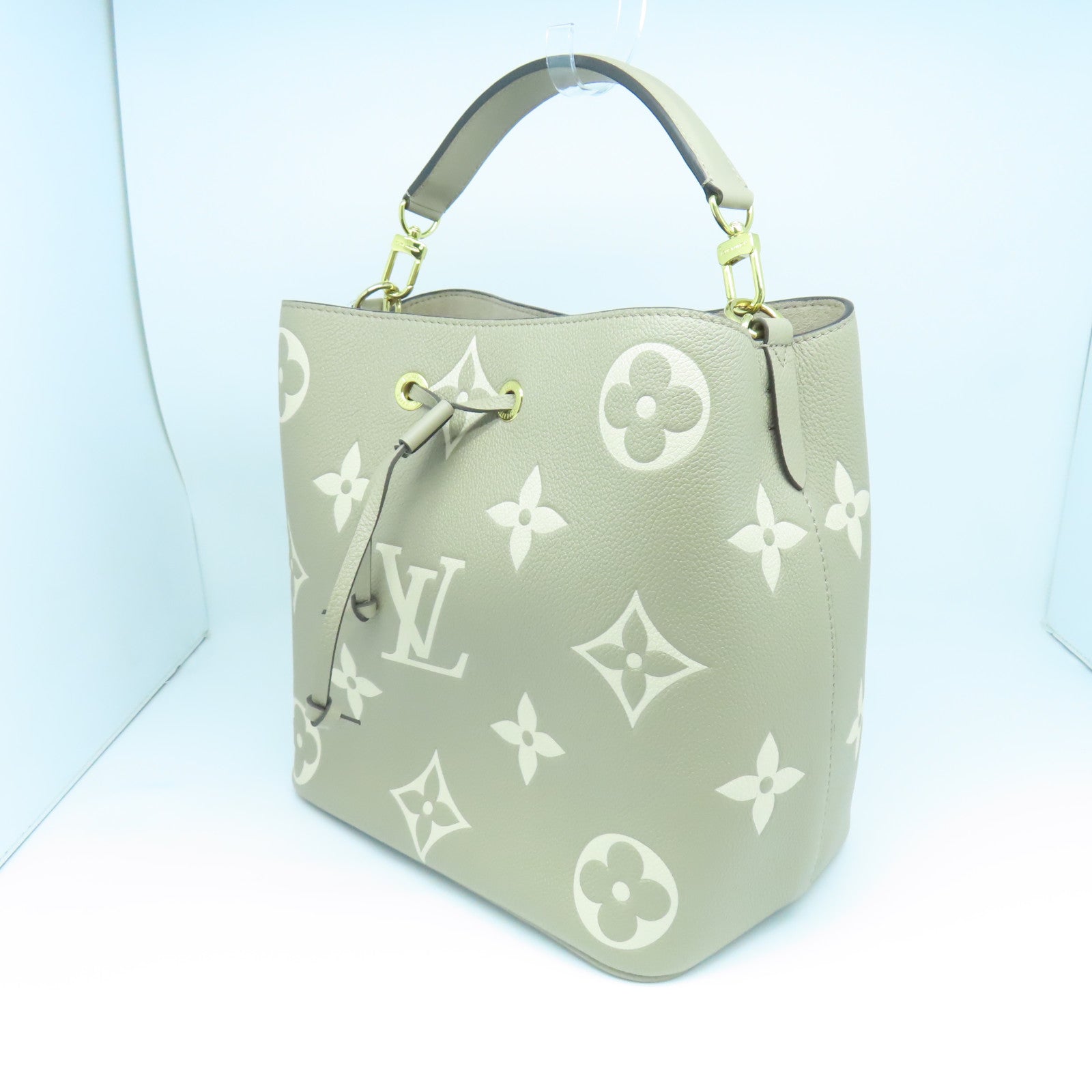 LOUIS VUITTON Mono Empreinte NeoNoe MM gold buckle handle bag beige