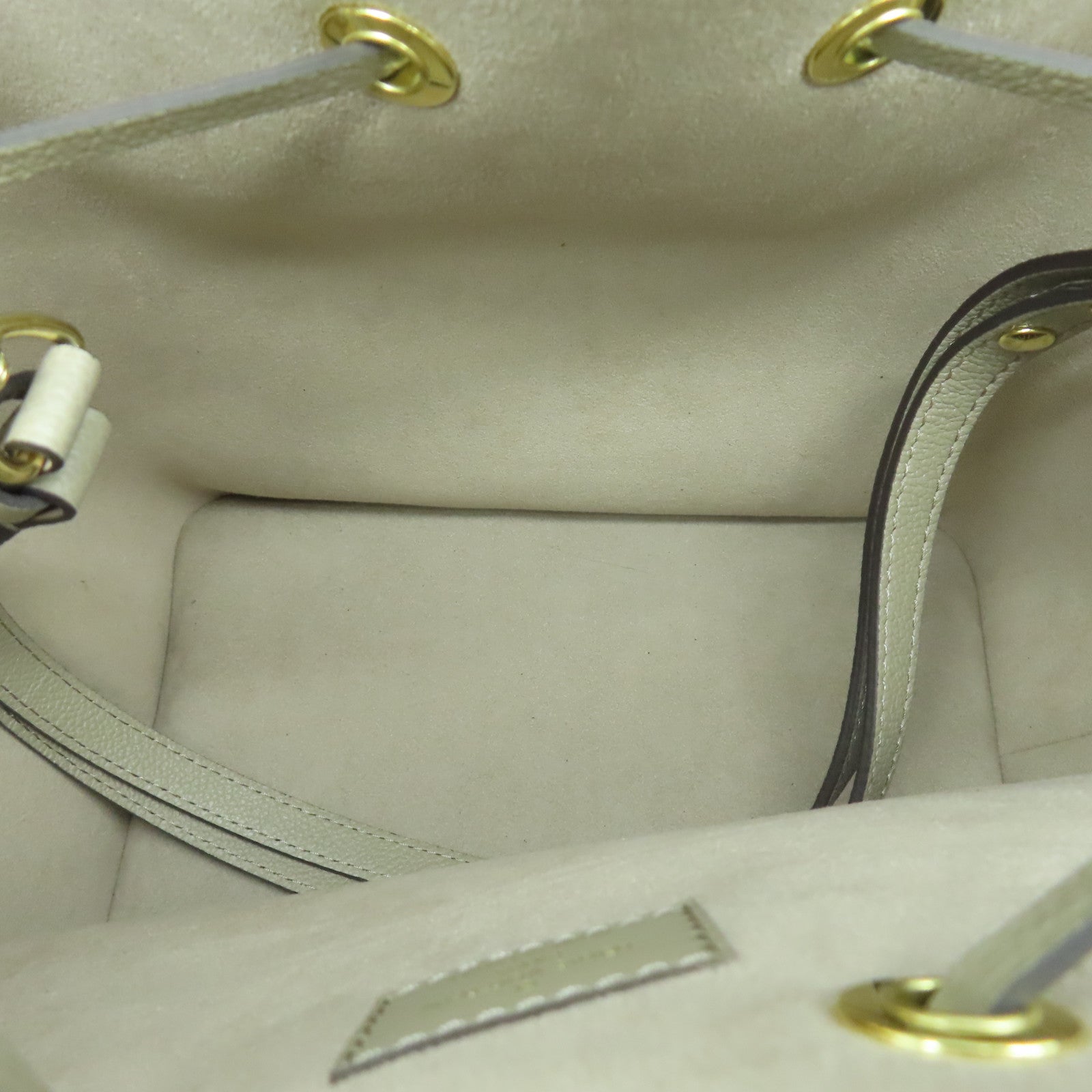 LOUIS VUITTON Mono Empreinte NeoNoe MM gold buckle handle bag beige