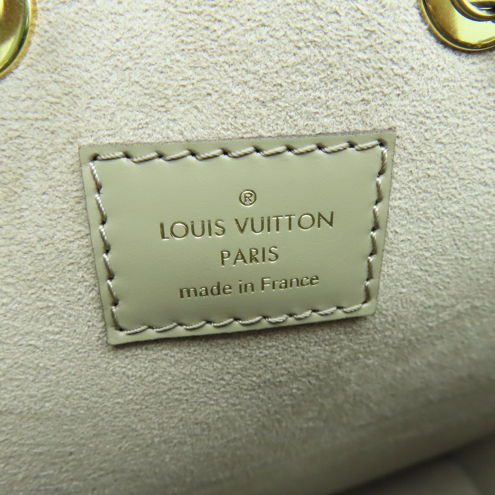 LOUIS VUITTON Mono Empreinte NeoNoe MM gold buckle handle bag beige