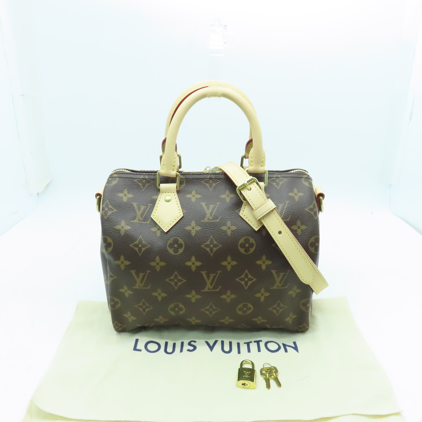 LOUIS VUITTON Monogram Speedy Bandouliere 25 gold buckle handle shoulder bag brown