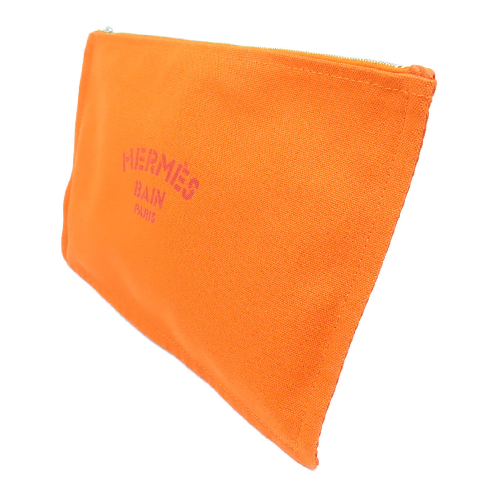 HERMES 帆布Bain Pouch金扣手拿包橙色