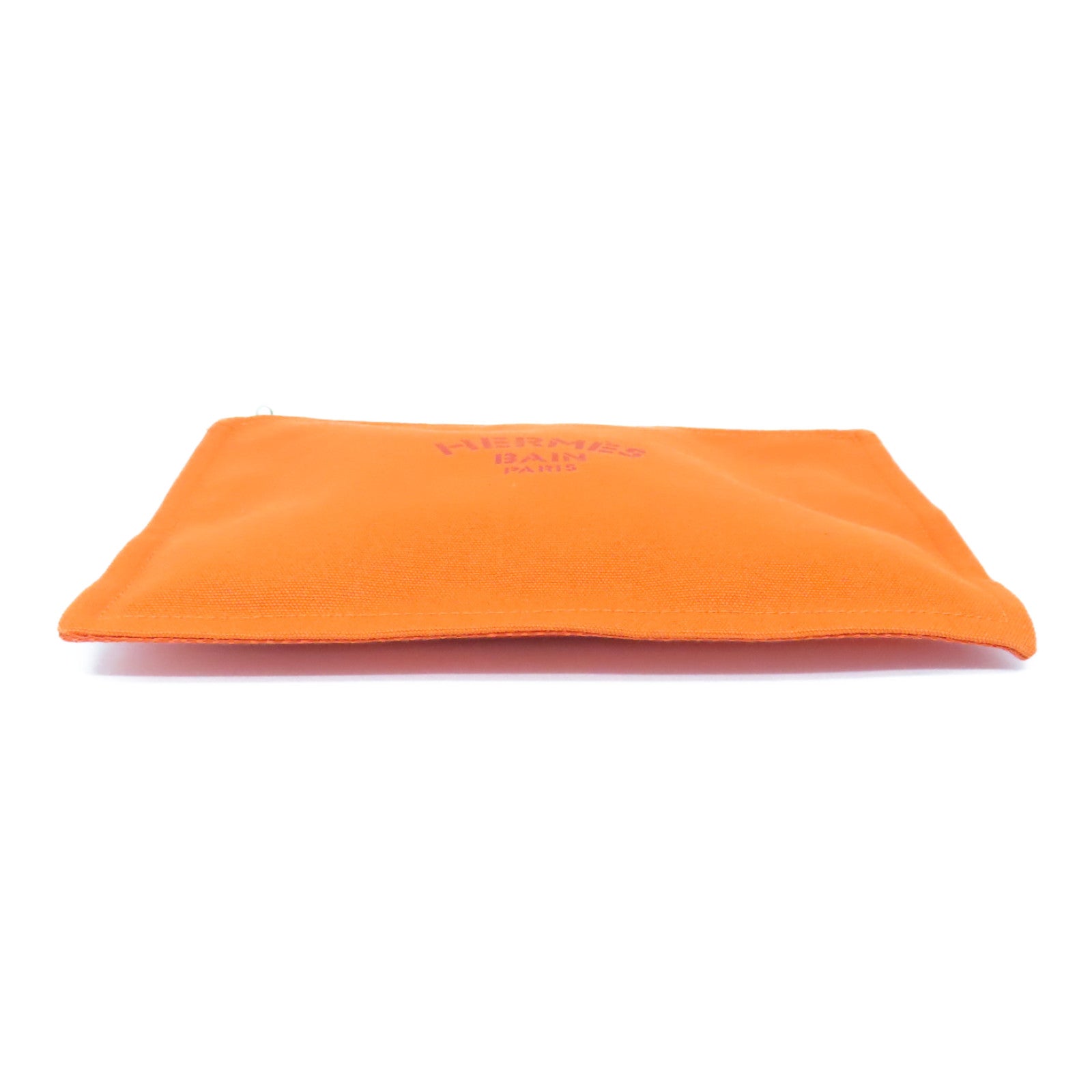 HERMES 帆布Bain Pouch金扣手拿包橙色