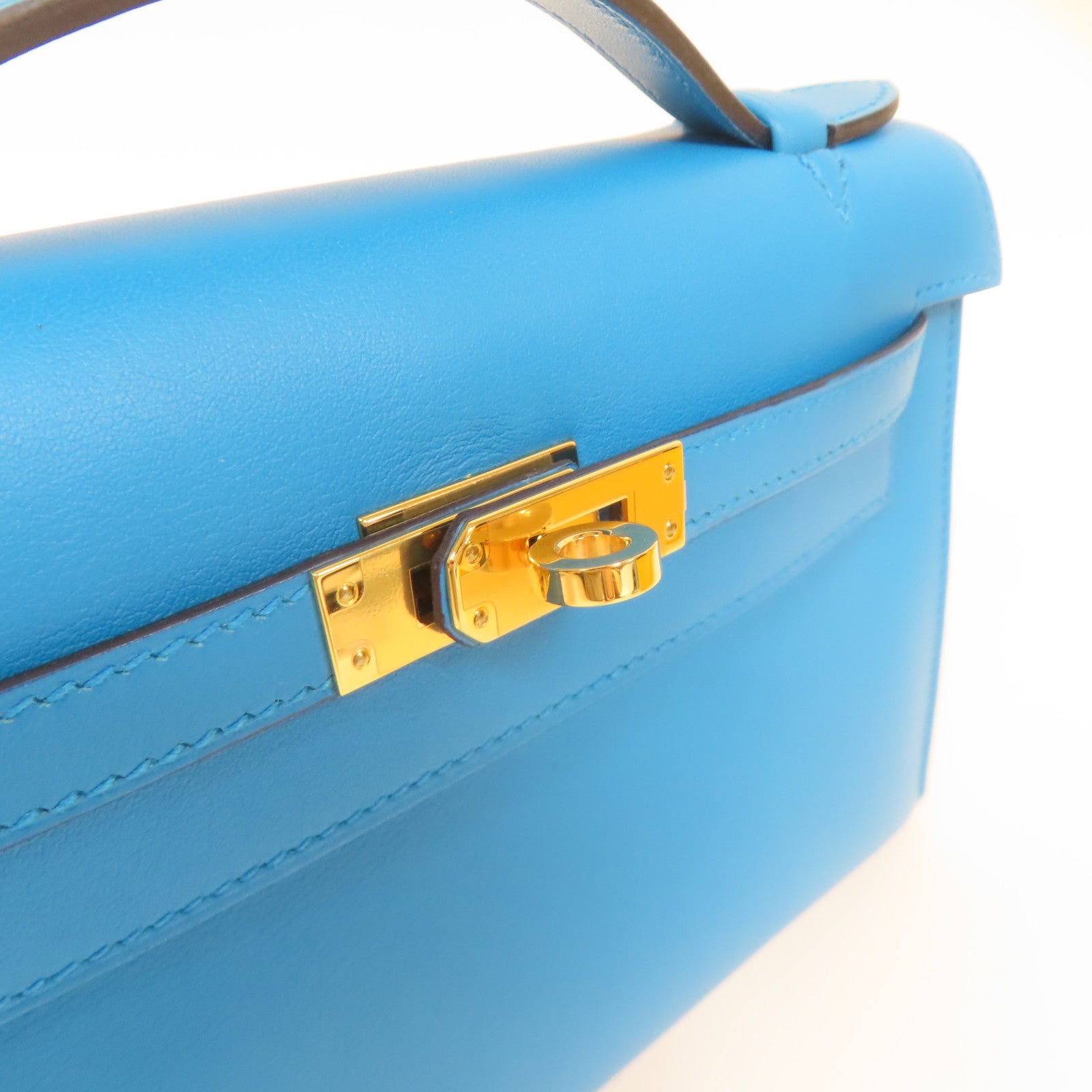 HERMES Veau Swift皮革Kelly Pochette金扣手挽袋藍色