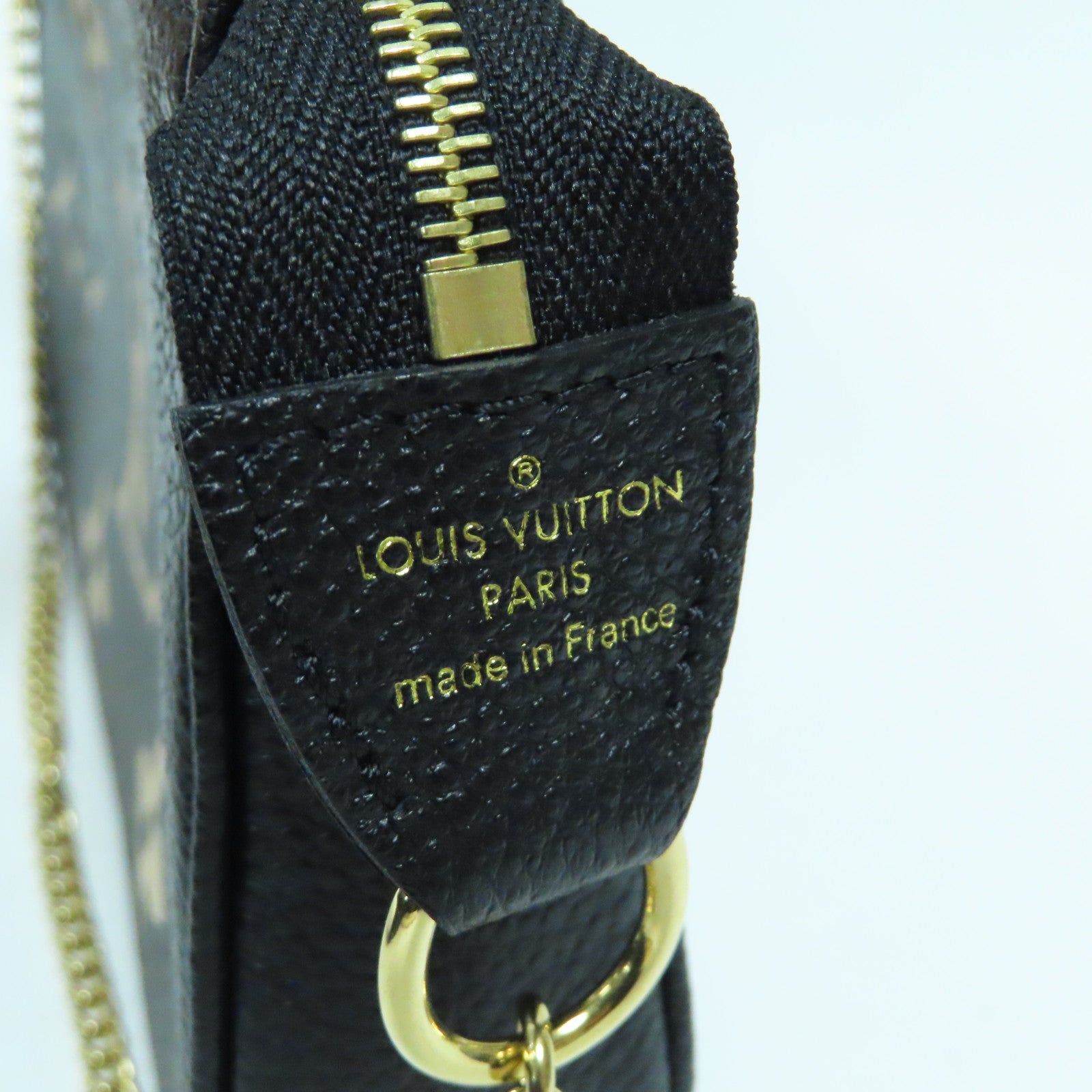 LOUIS VUITTON Monogram Empreinte Mini Pochette金扣手挽袋黑色