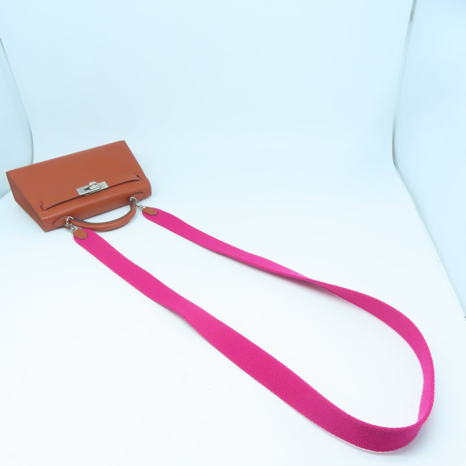 HERMES Chevre皮革Mini Kelly銀扣手挽肩背兩用袋Cuivre南瓜色