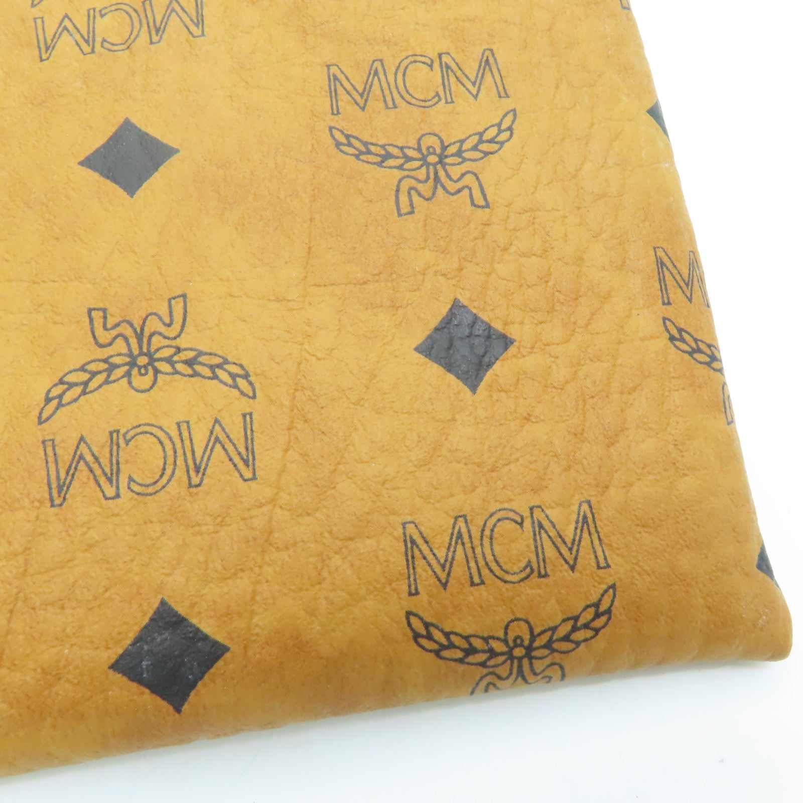 MCM 皮革Pouch金扣手拿包啡色