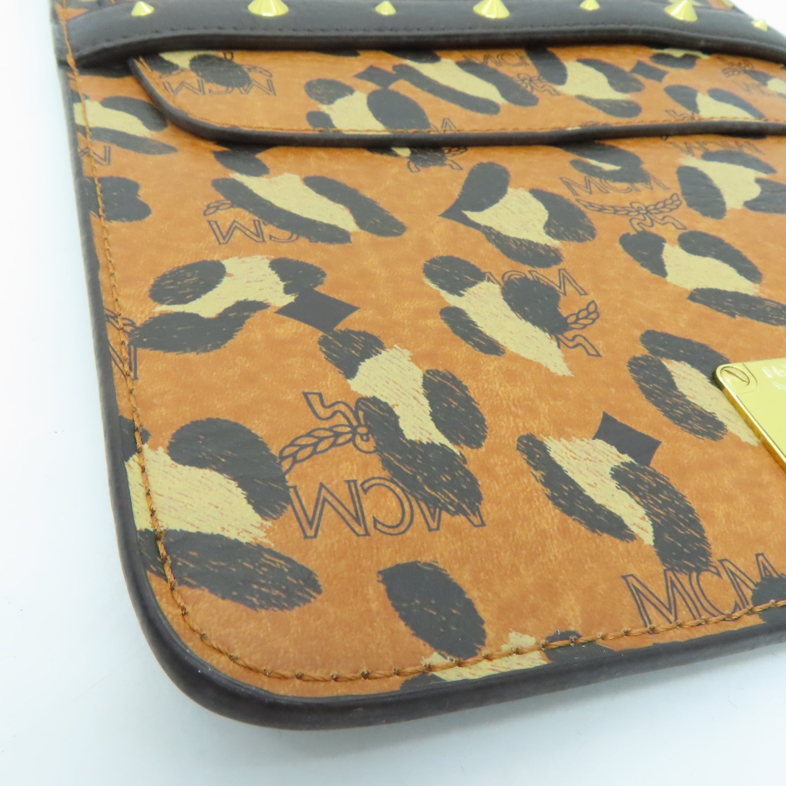 MCM 皮革Clutch Bag金扣手拿包黑色/啡色