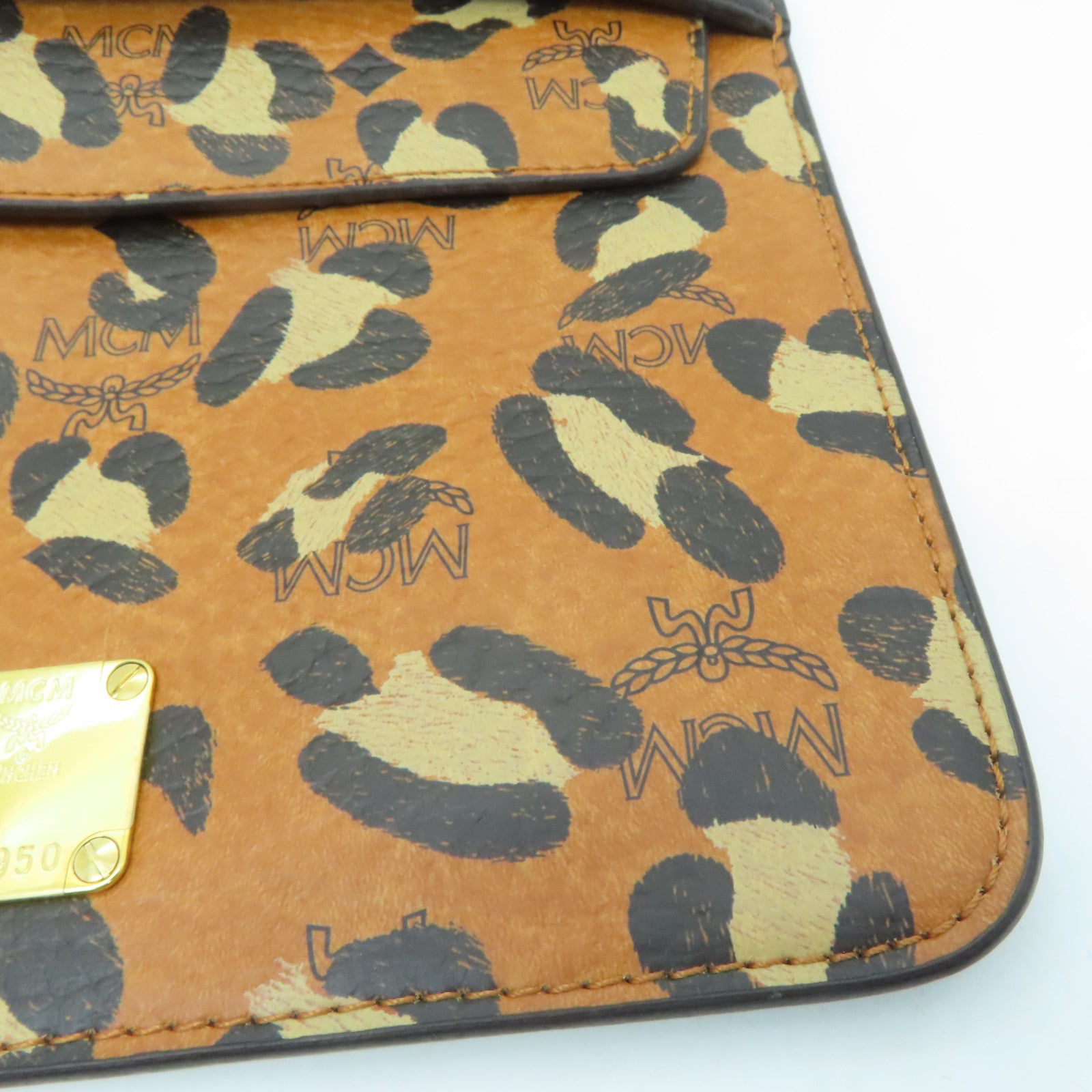 MCM 皮革Clutch Bag金扣手拿包黑色/啡色
