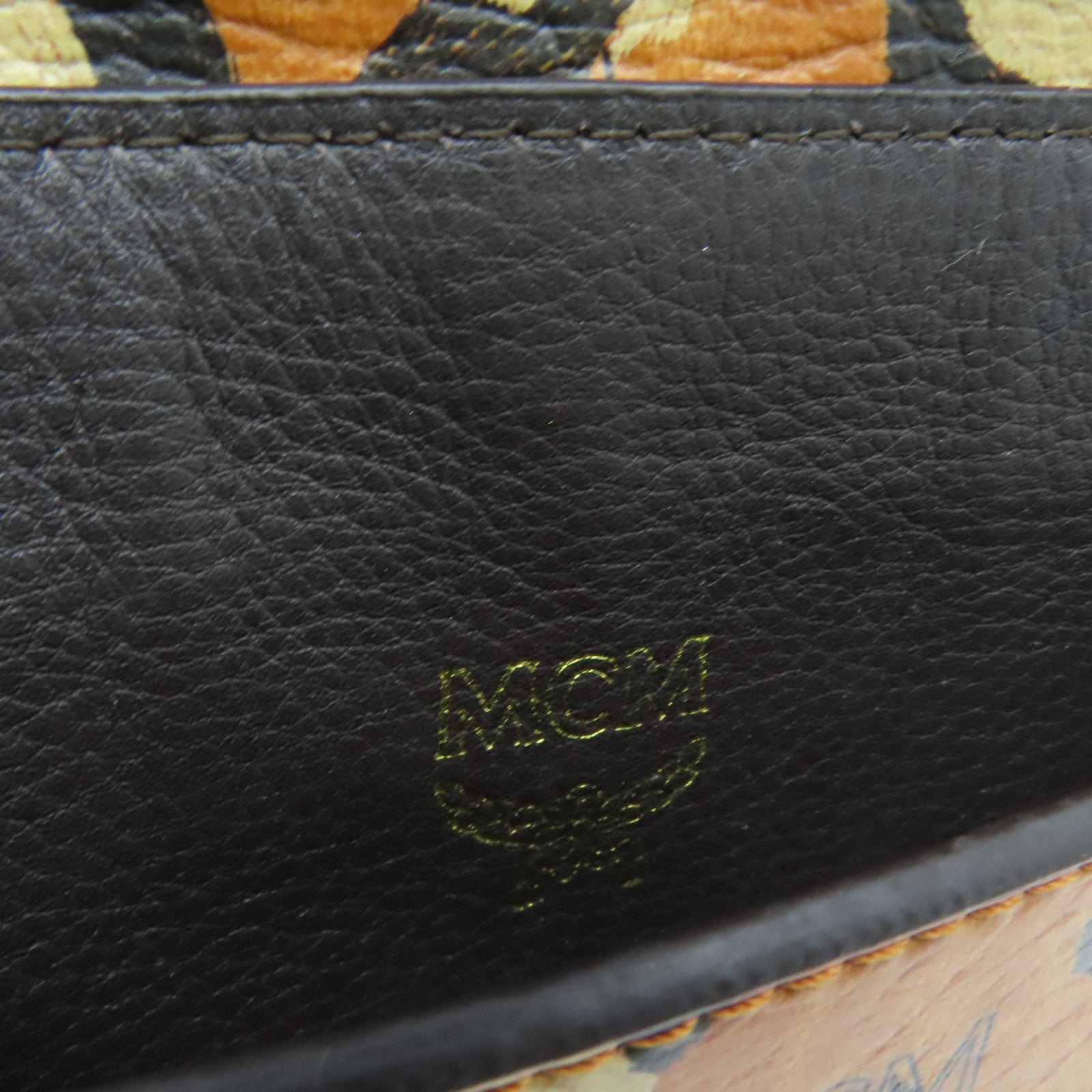 MCM 皮革Clutch Bag金扣手拿包黑色/啡色