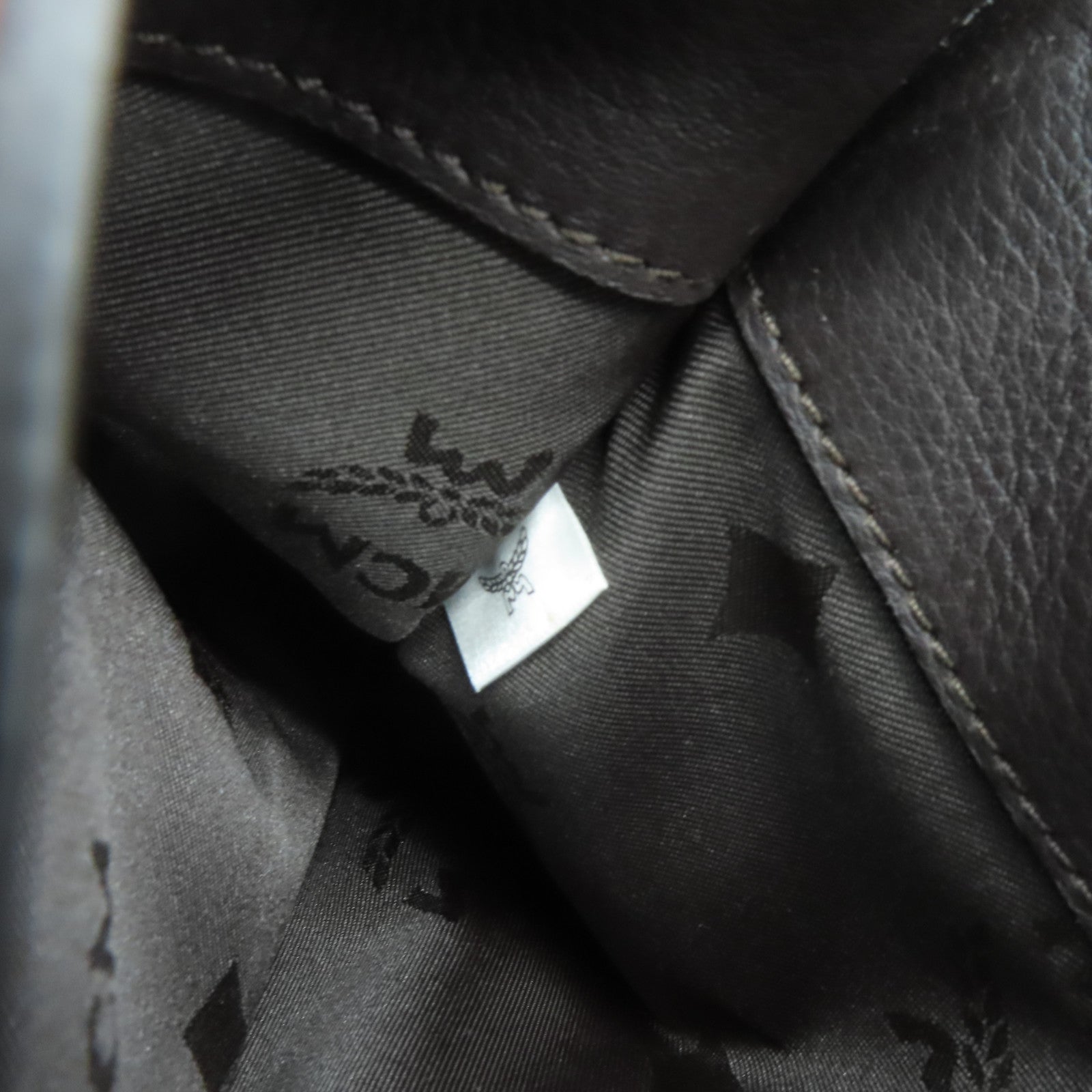 MCM 皮革Clutch Bag金扣手拿包黑色/啡色