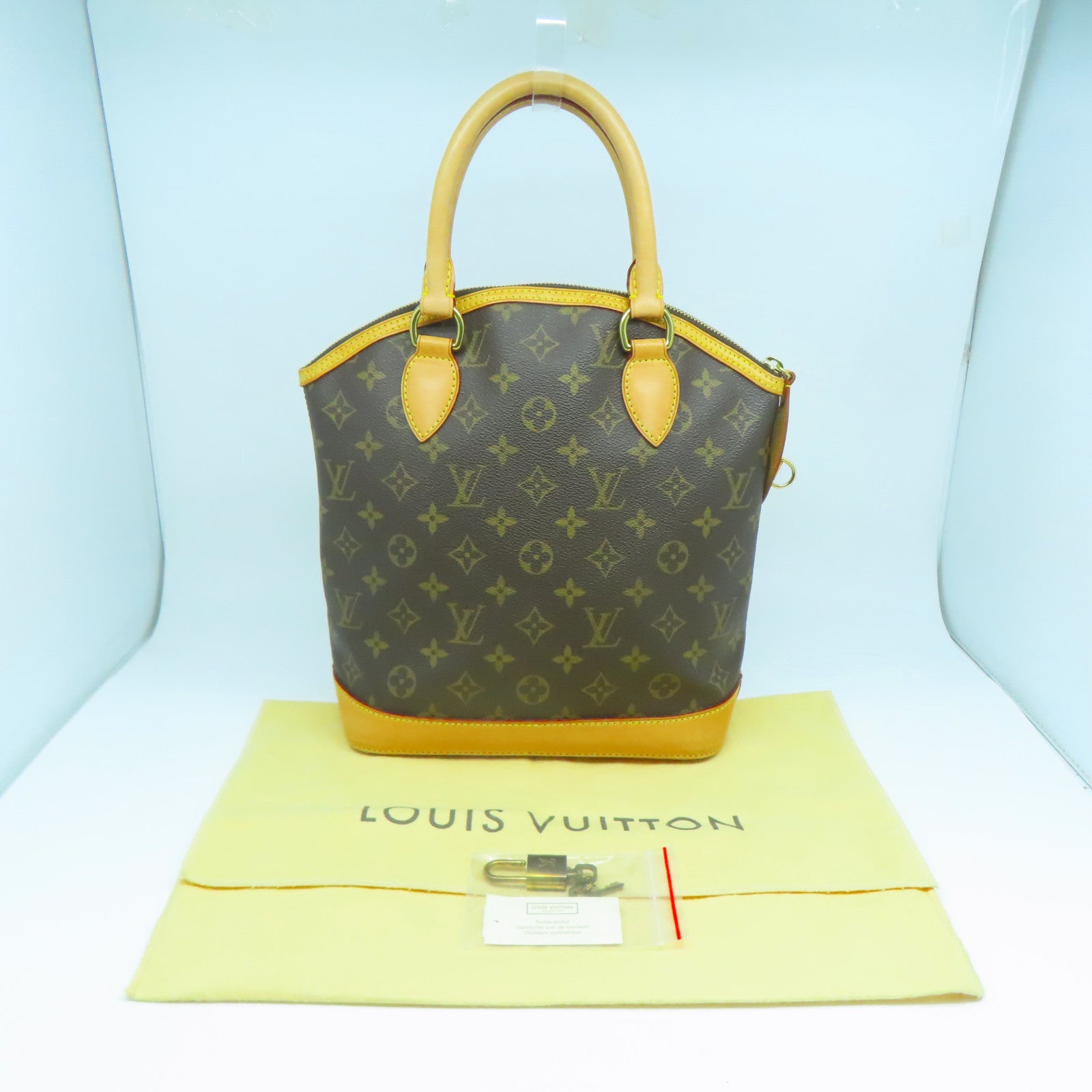 LOUIS VUITTON Monogram Lockit金扣手挽袋啡色