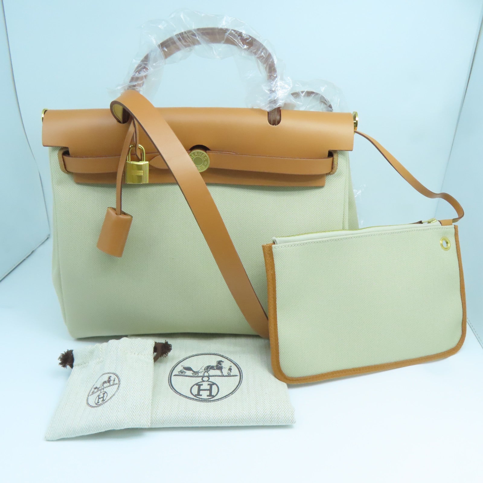 HERMES 帆布Herbag PM金扣手挽肩背兩用袋奶茶色/馬鞍皮駝色