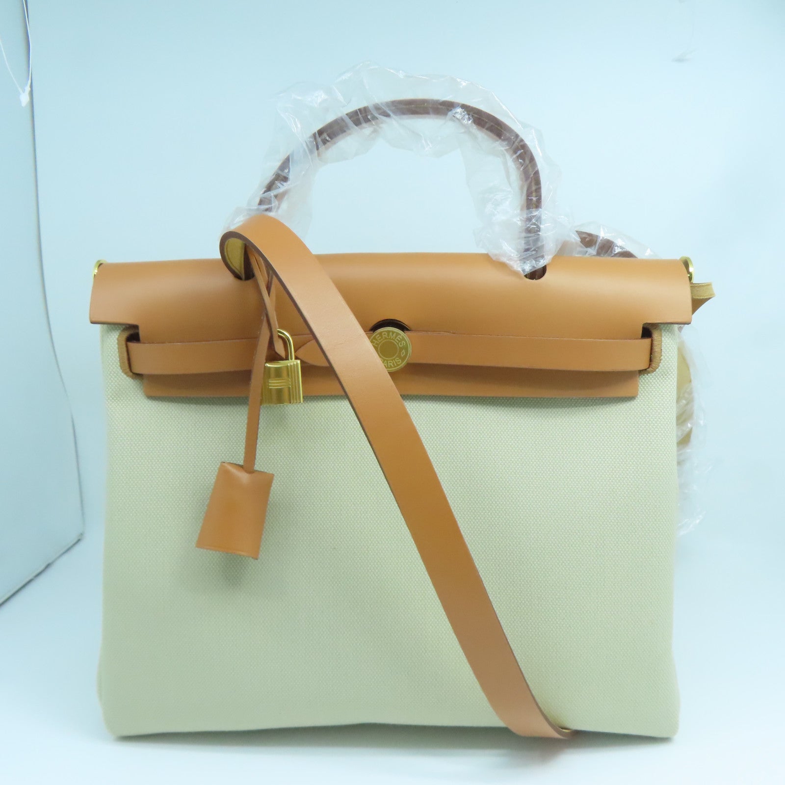 HERMES 帆布Herbag PM金扣手挽肩背兩用袋奶茶色/馬鞍皮駝色