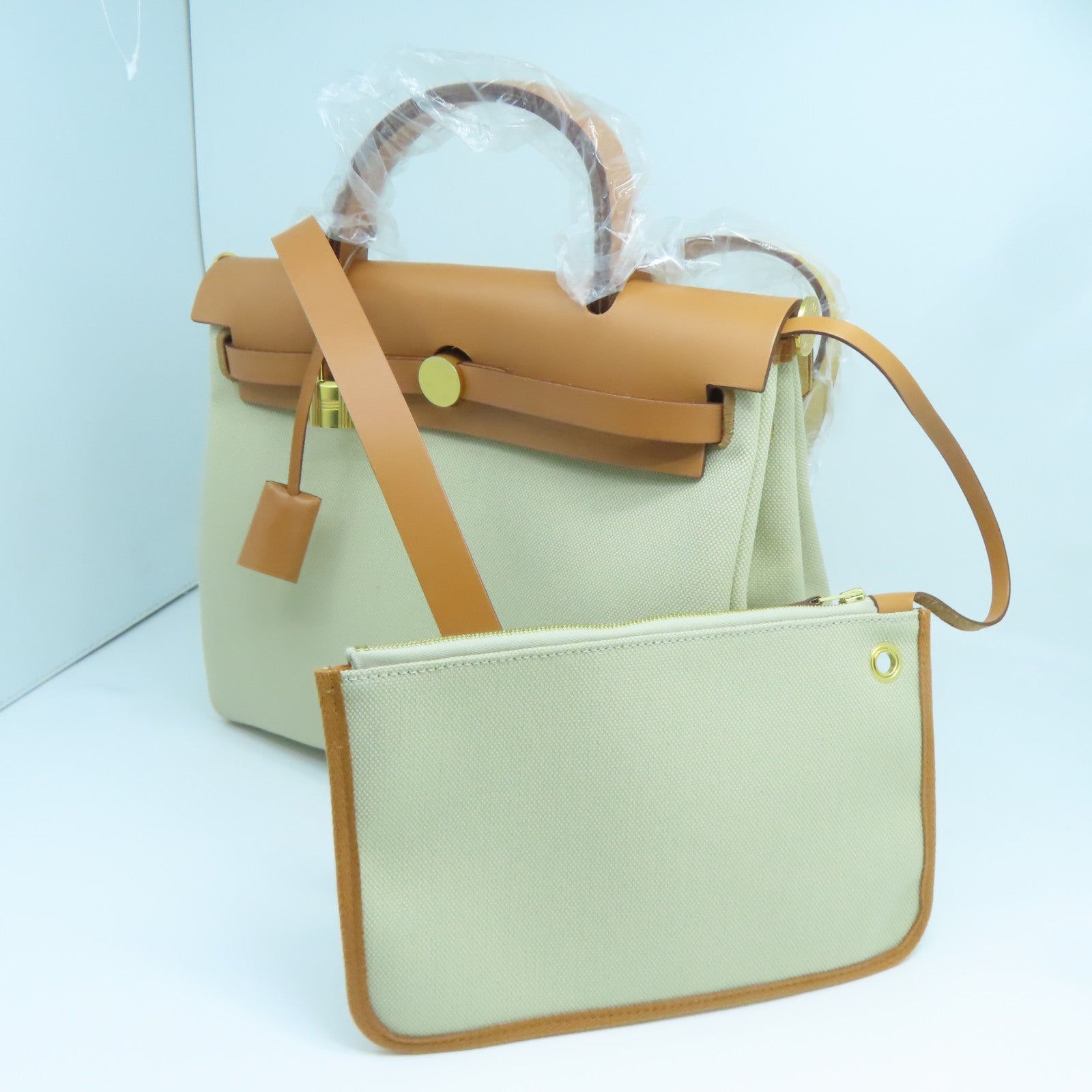 HERMES 帆布Herbag PM金扣手挽肩背兩用袋奶茶色/馬鞍皮駝色