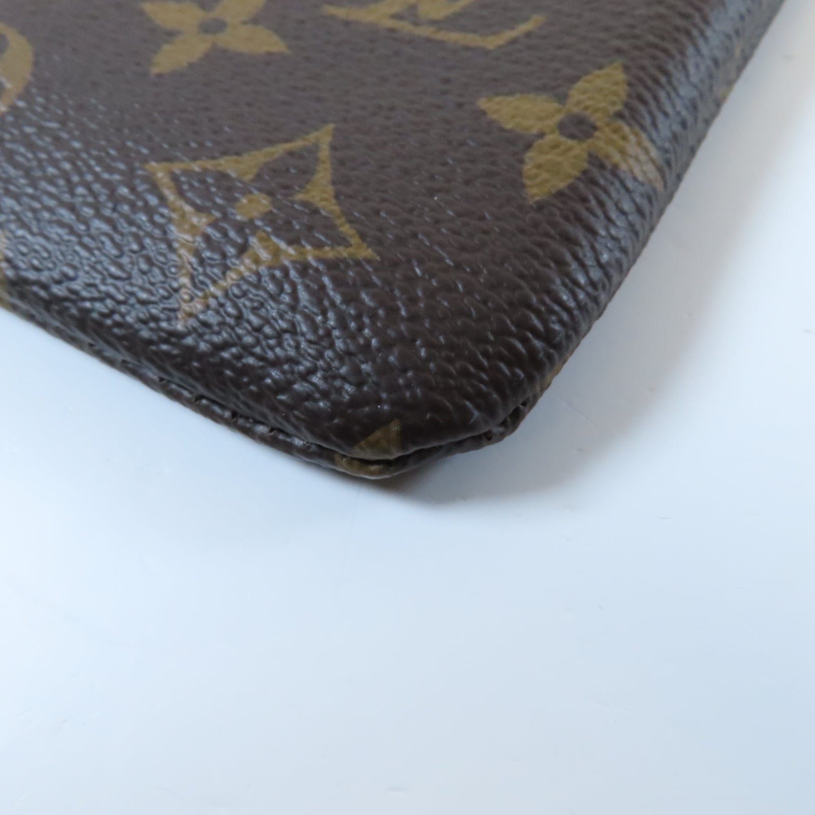 LOUIS VUITTON Monogram Daily Pouch金扣手拿包啡色/粉紅色