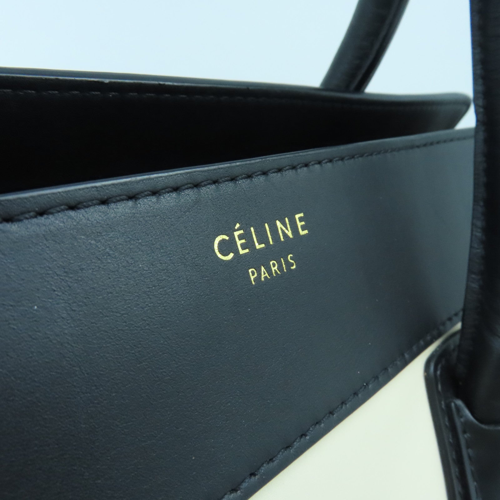CELINE 牛皮皮革Mini Luggage金扣手挽袋黑色/啡色/白色