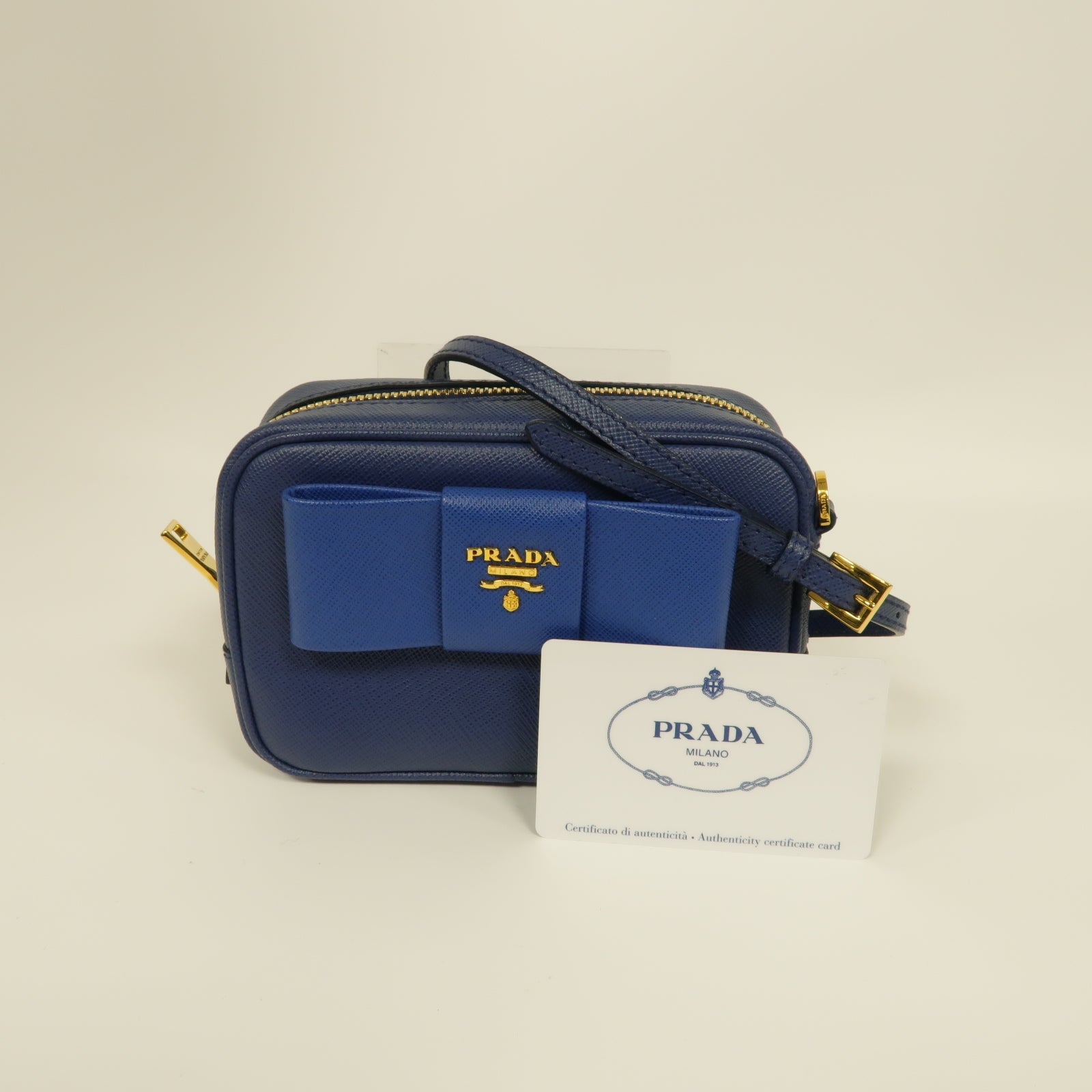 PRADA Saffiano皮革Mini Bag金扣肩背袋藍色