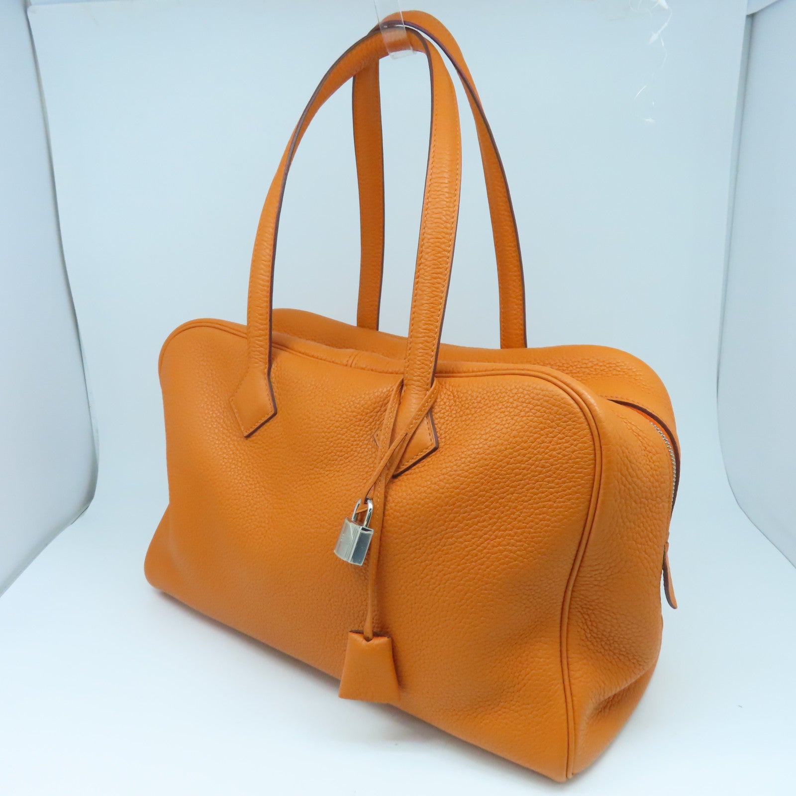 HERMES Clemence皮革Victolia銀扣手挽袋橙色