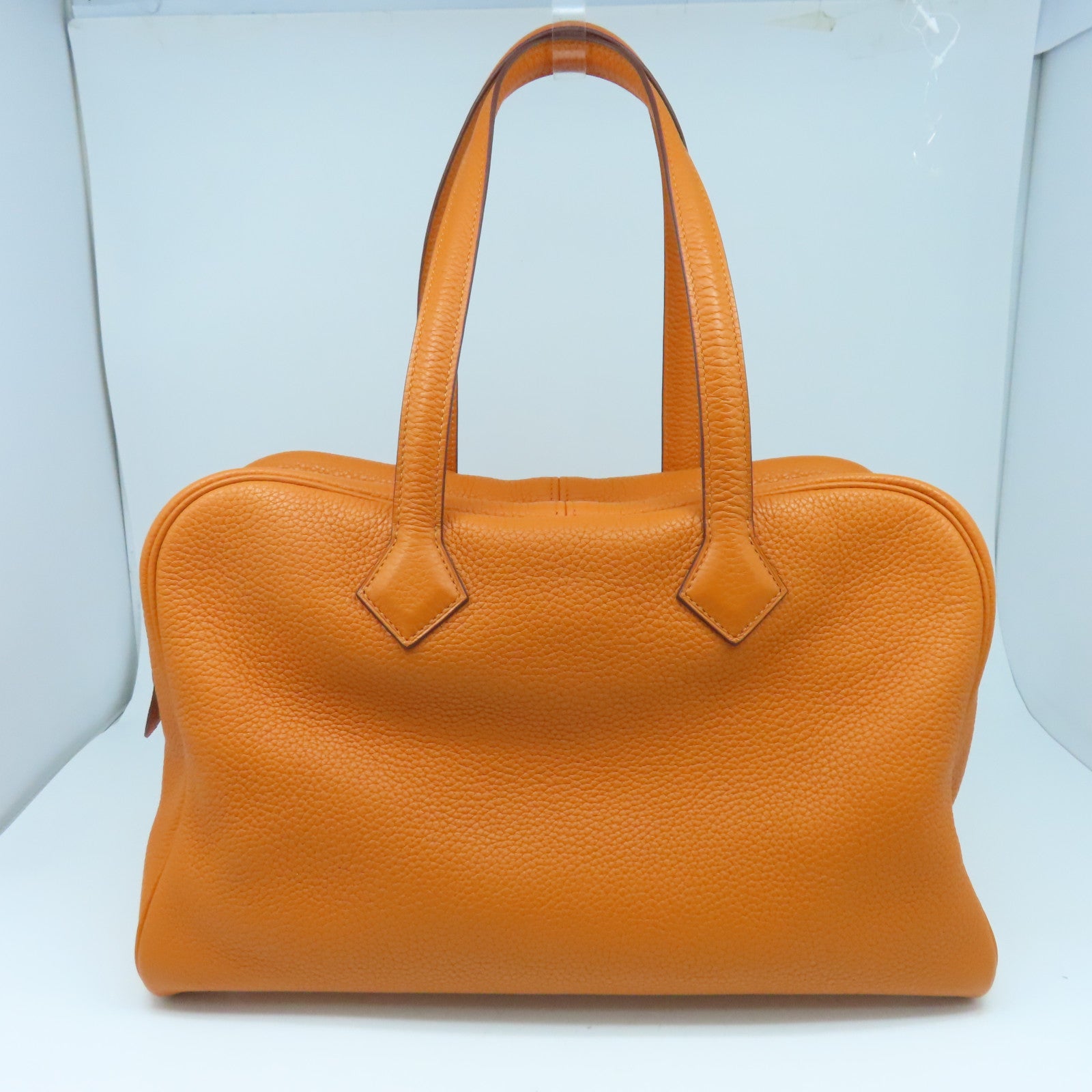 HERMES Clemence皮革Victolia銀扣手挽袋橙色