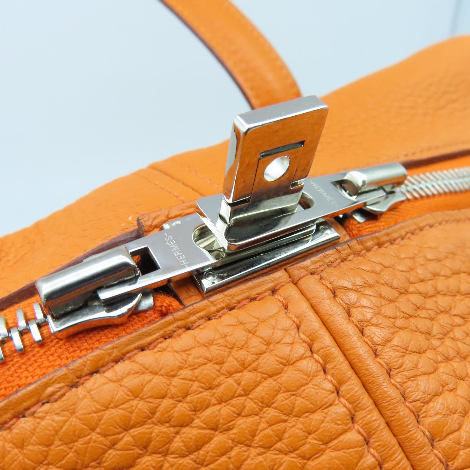 HERMES Clemence皮革Victolia銀扣手挽袋橙色