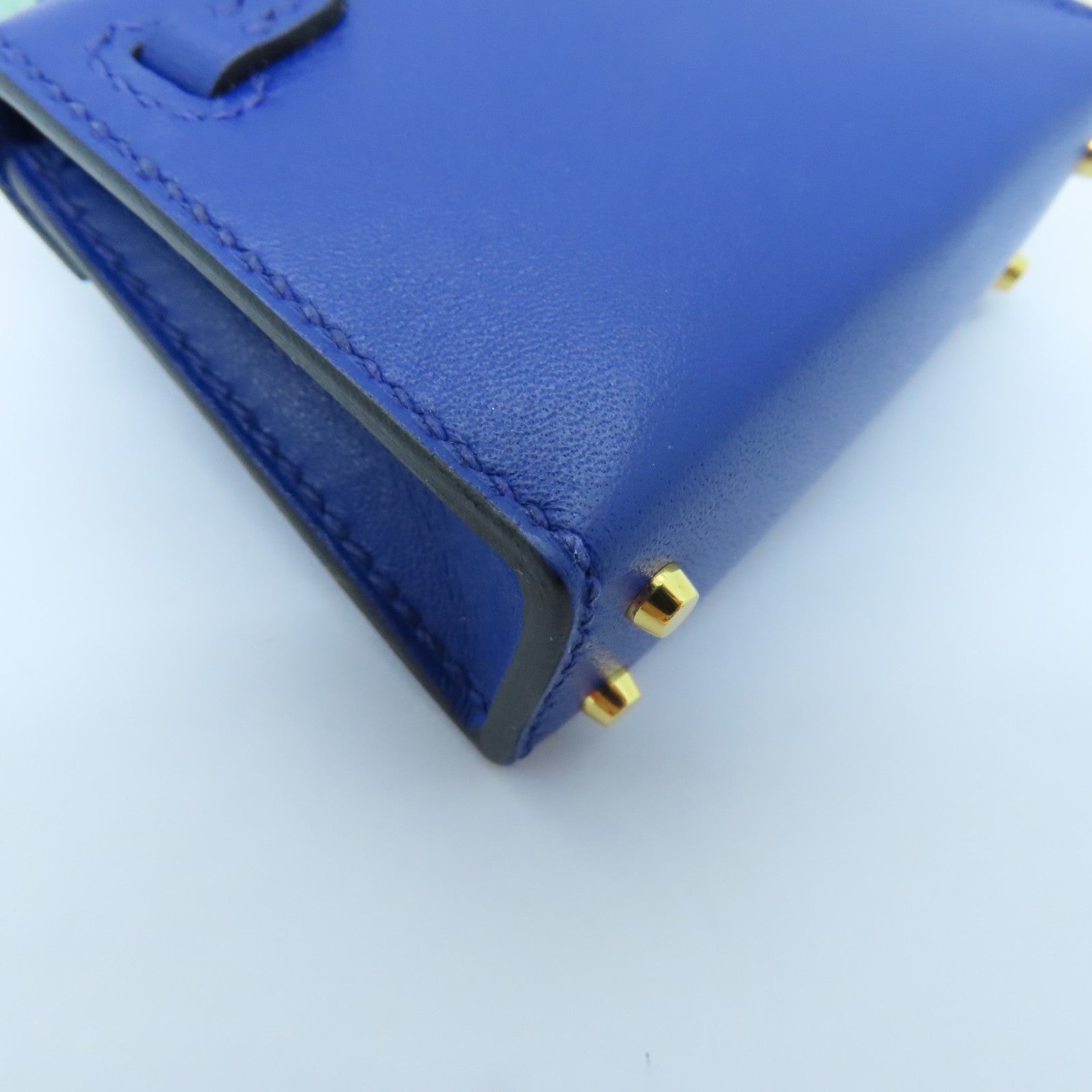 HERMES Tadelakt皮革Kelly Twilly Bag Charm金扣掛飾Bleu Electrique藍色