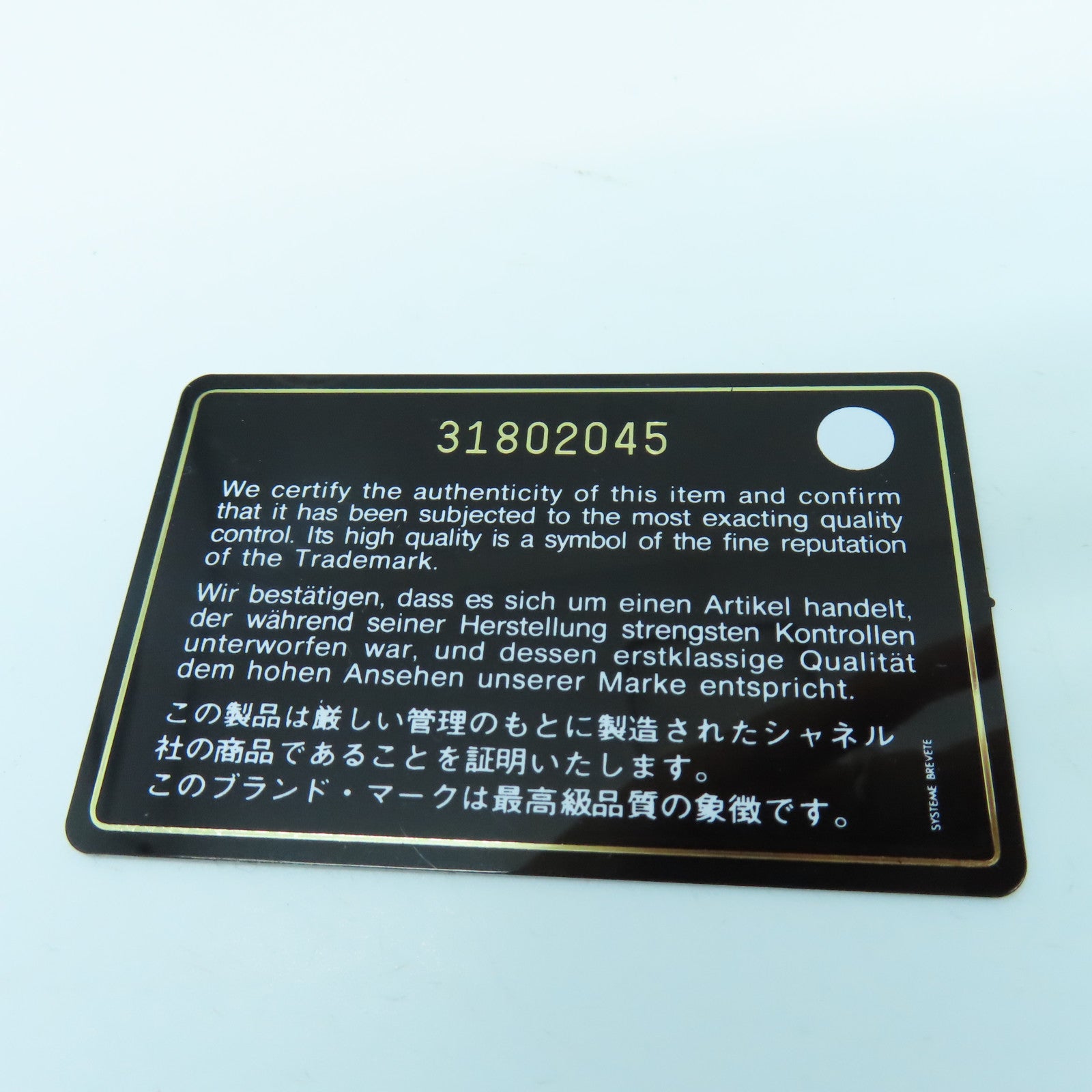 CHANEL 菱格Caviar皮革Camera Bag银扣肩背袋白色
