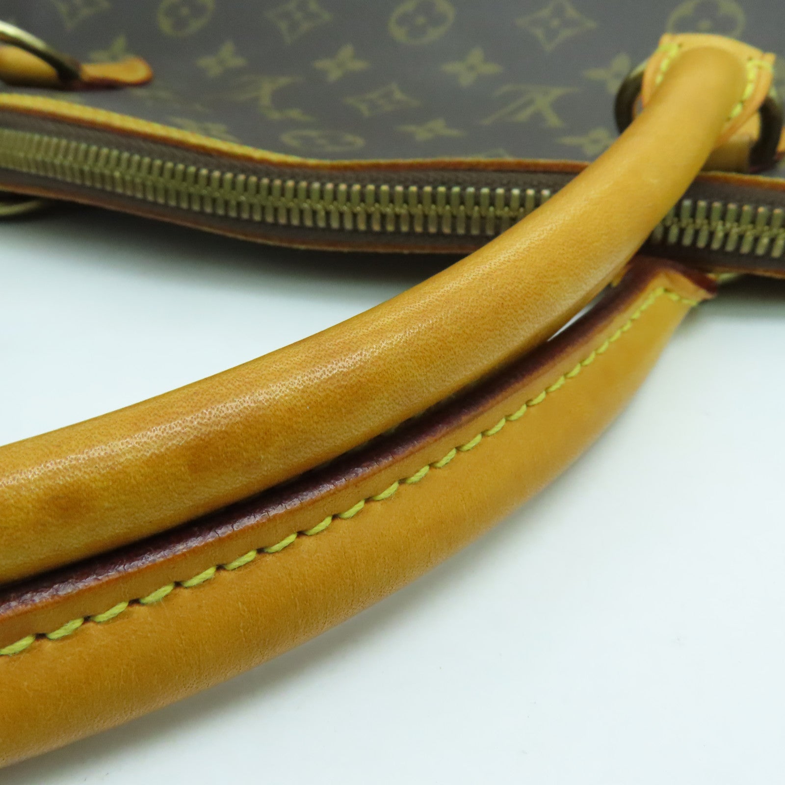 LOUIS VUITTON Monogram Lockit Horizontal gold buckle handle bag brown
