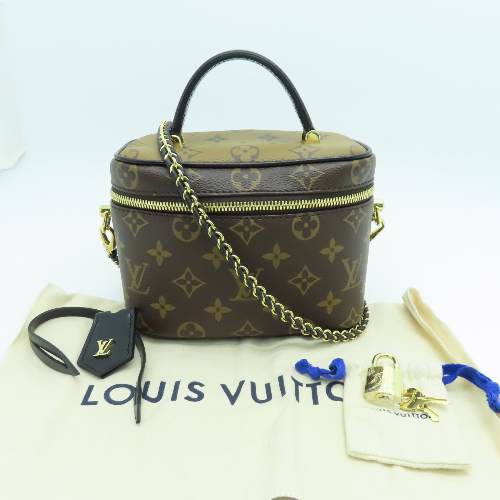 LOUIS VUITTON Monogram Reverse Vanity PM金扣手挽肩背两用袋啡色