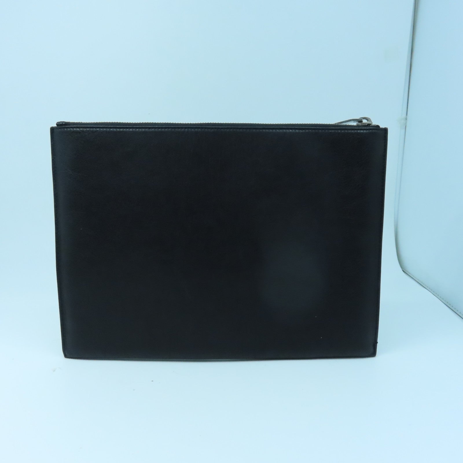 SAINT LAURENT 牛皮皮革Pouch銀扣手拿包黑色