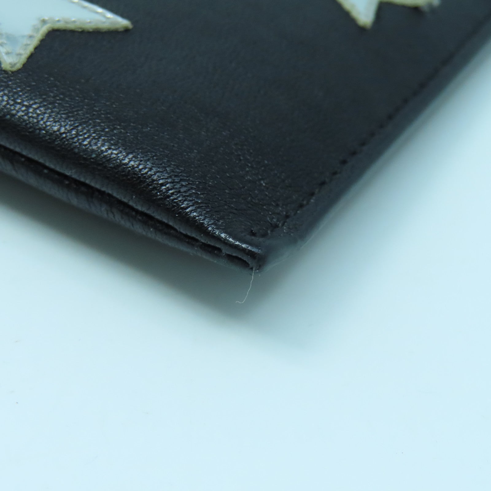 SAINT LAURENT 牛皮皮革Pouch銀扣手拿包黑色