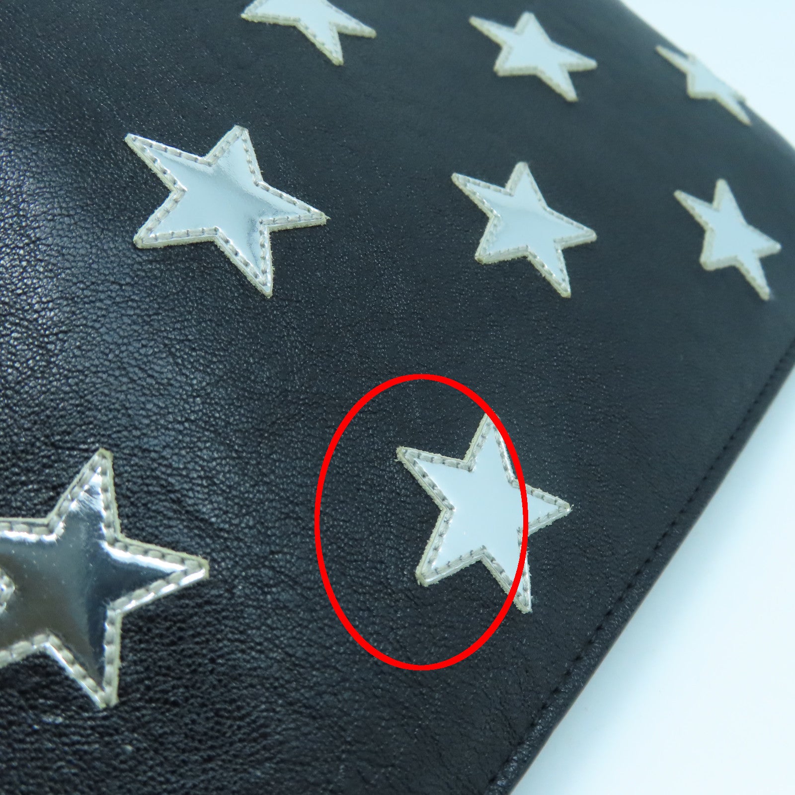 SAINT LAURENT 牛皮皮革Pouch銀扣手拿包黑色