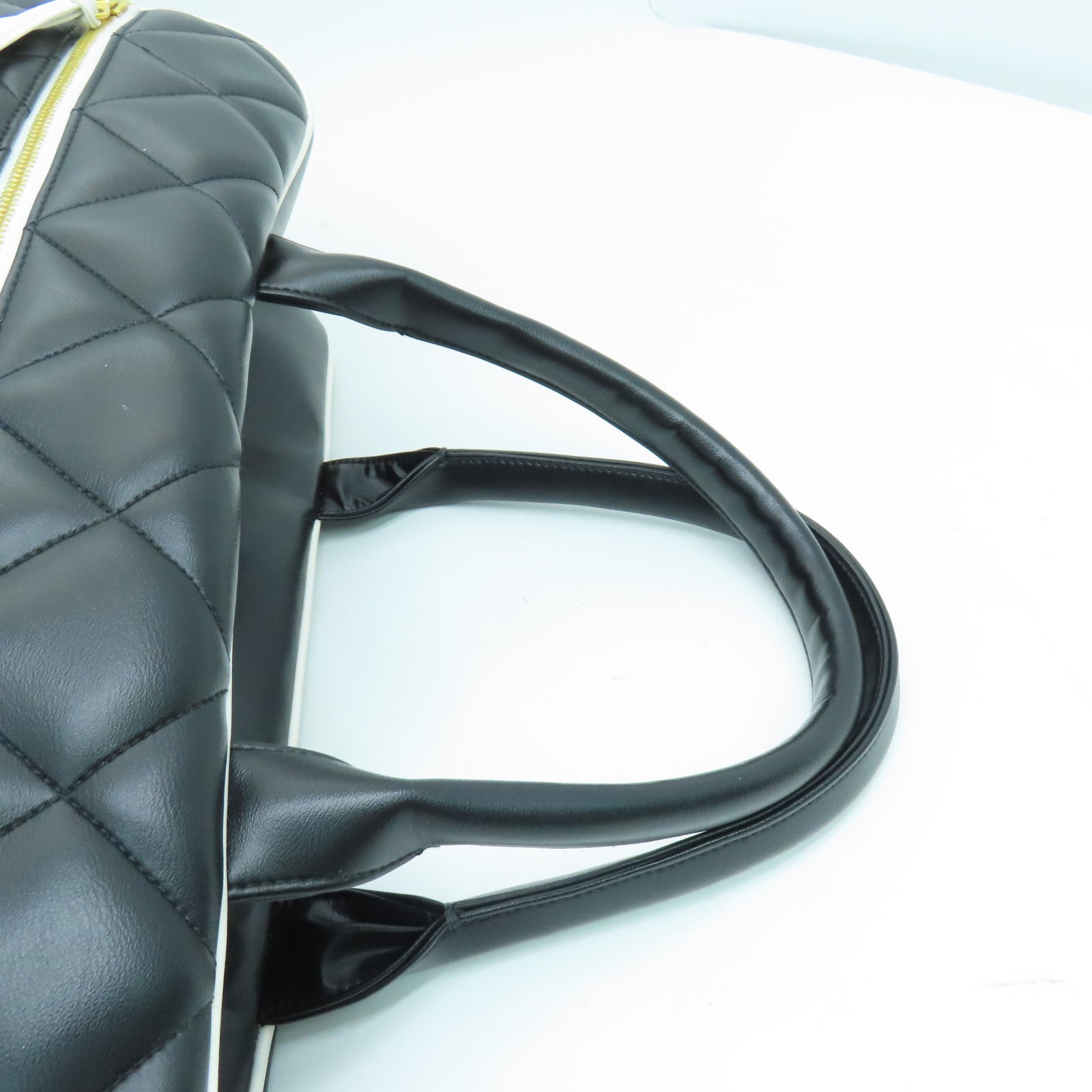 CHANEL 菱格牛皮皮革Travelling Bag金扣旅行袋黑色