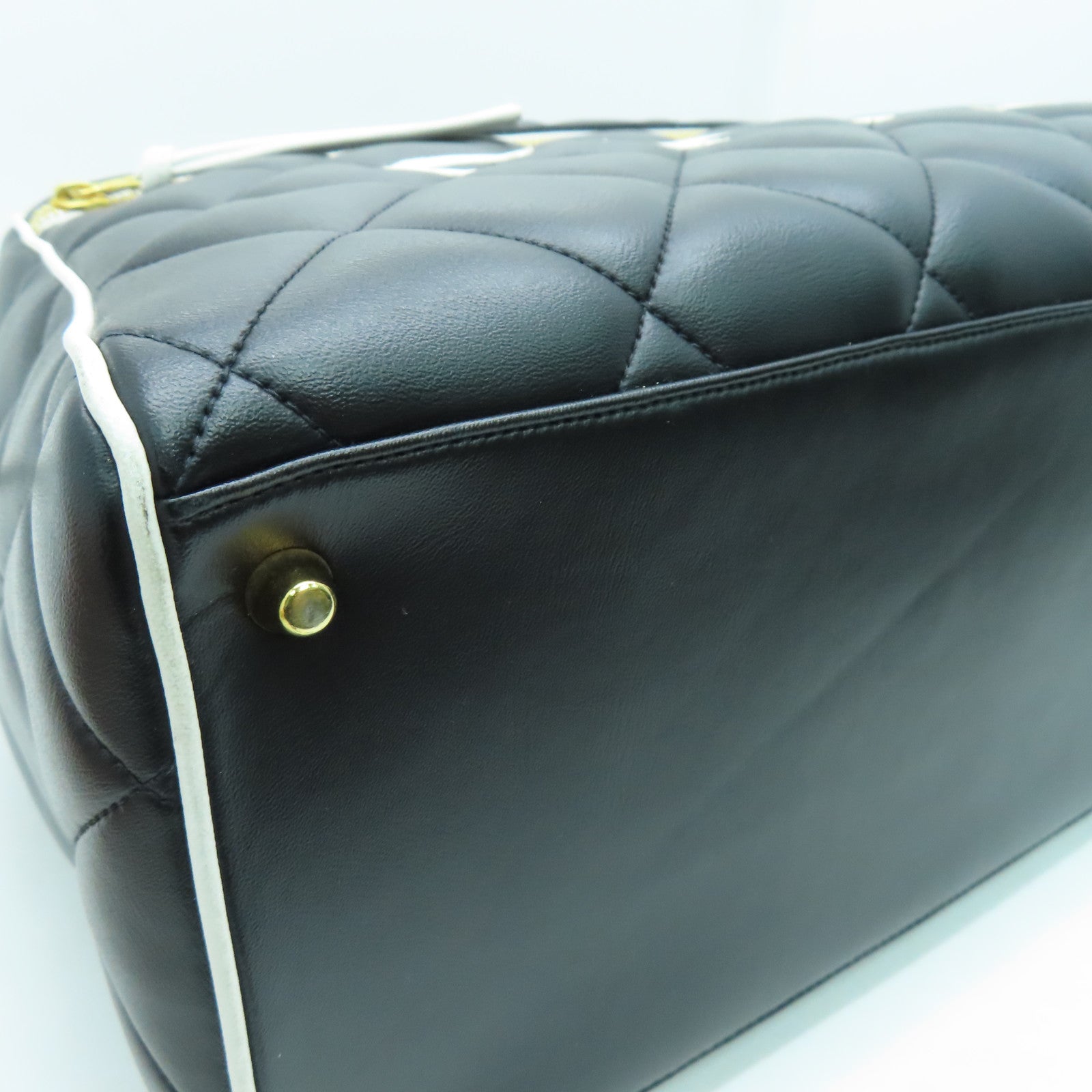CHANEL 菱格牛皮皮革Travelling Bag金扣旅行袋黑色