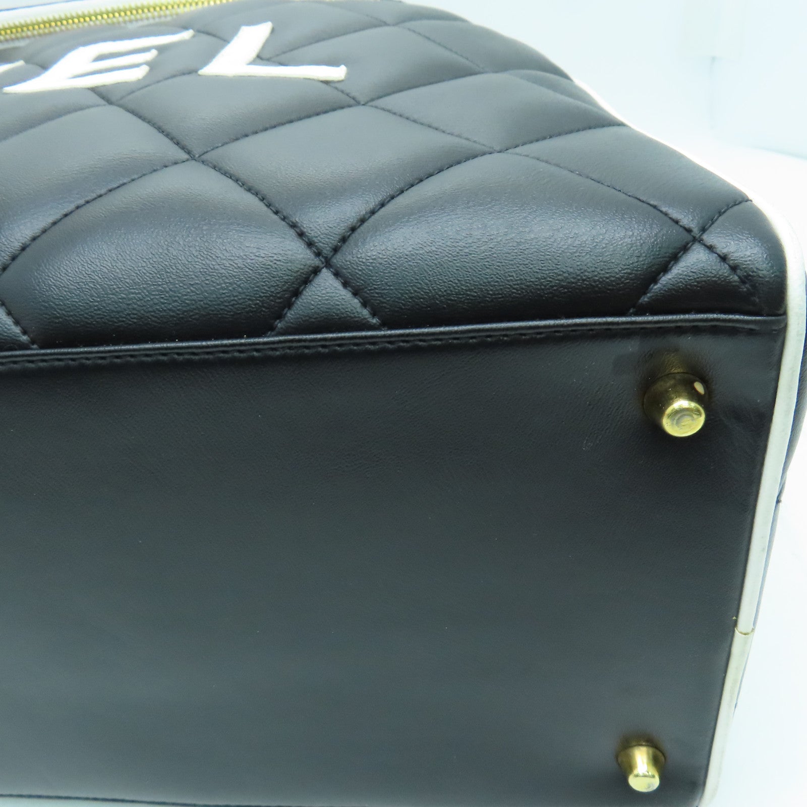 CHANEL 菱格牛皮皮革Travelling Bag金扣旅行袋黑色
