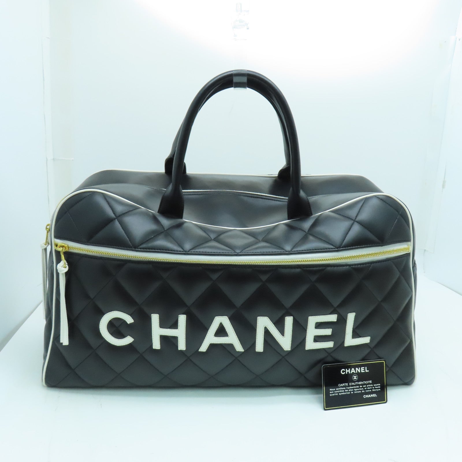 CHANEL 菱格牛皮皮革Travelling Bag金扣旅行袋黑色