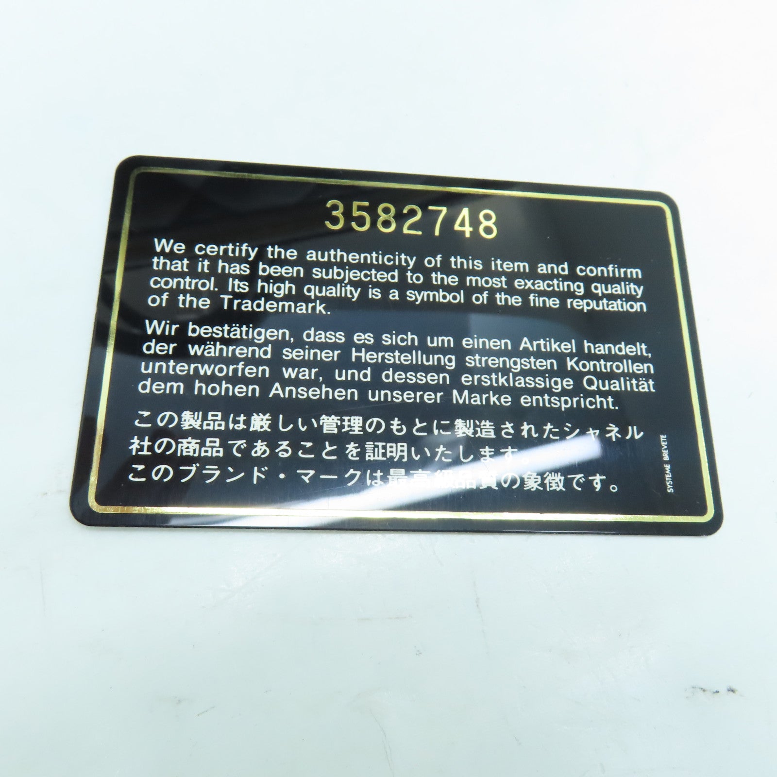CHANEL 菱格牛皮皮革Travelling Bag金扣旅行袋黑色