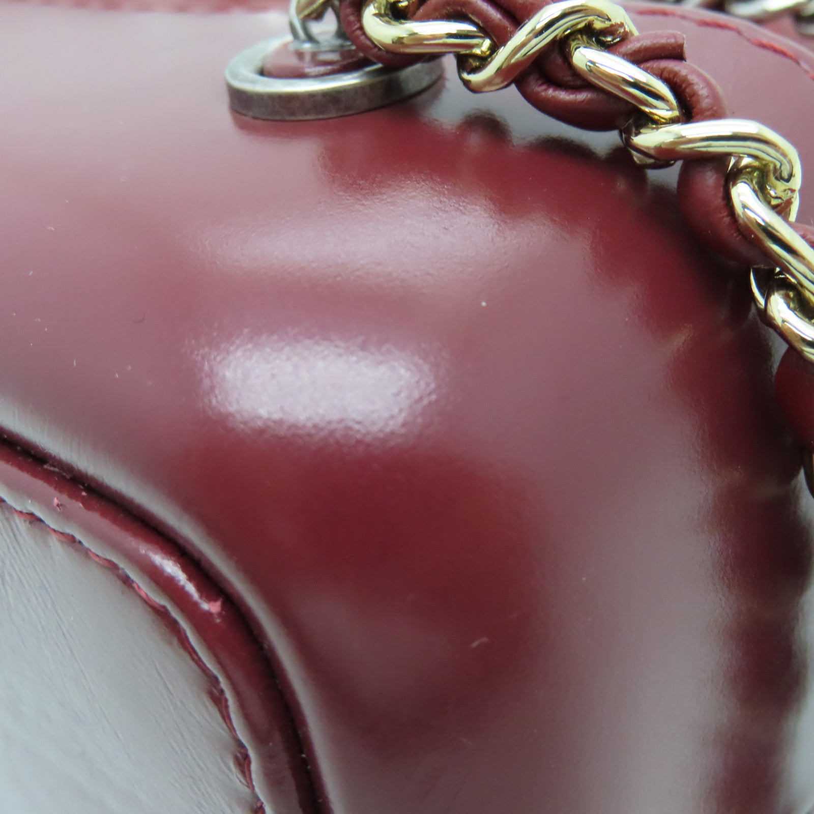 CHANEL rhombic cowhide leather Gabrielle Backpack gold and silver buckle chain belt backpack red