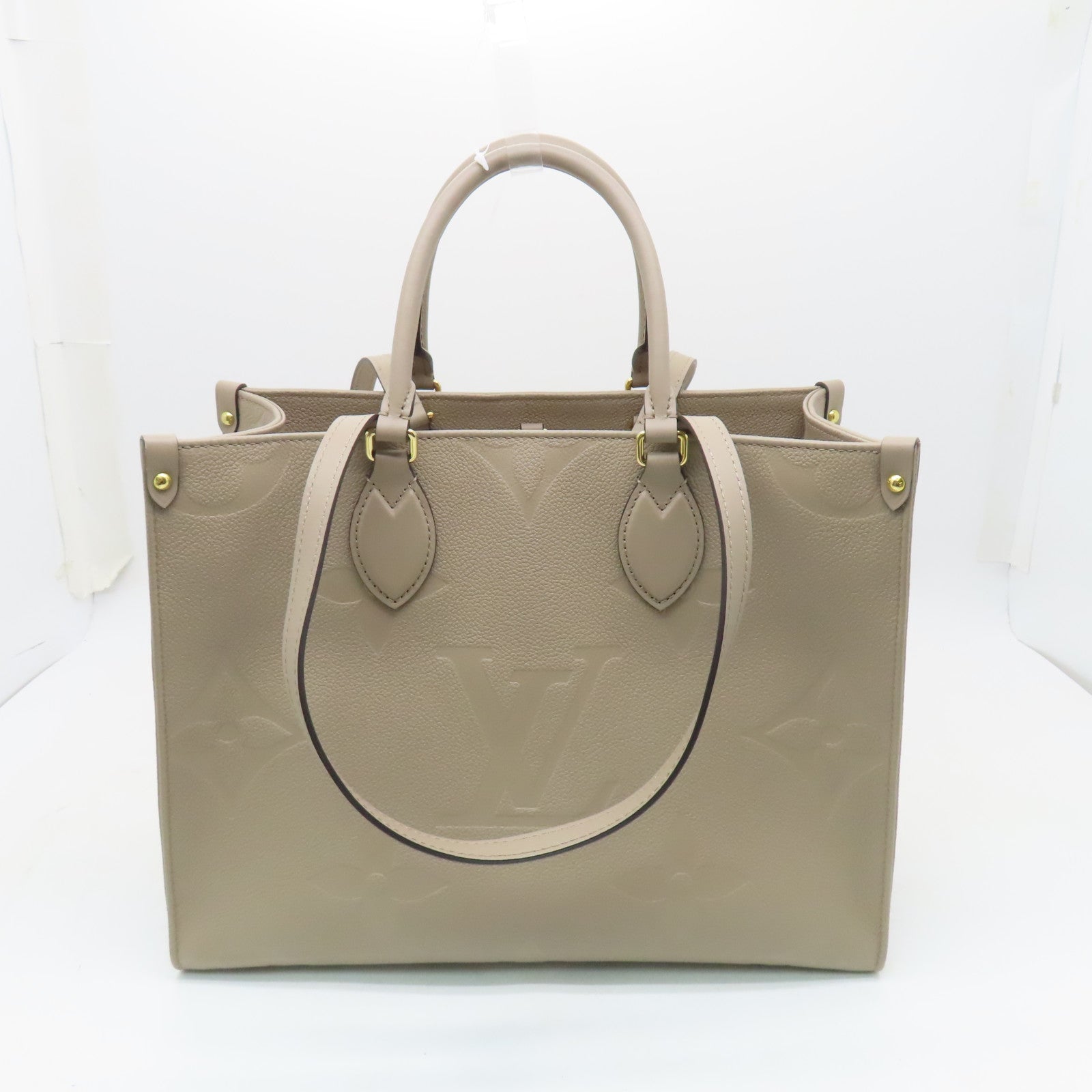 LOUIS VUITTON 【激減優惠】Monogram Empreinte Giant On The Go MM金扣手挽袋米色
