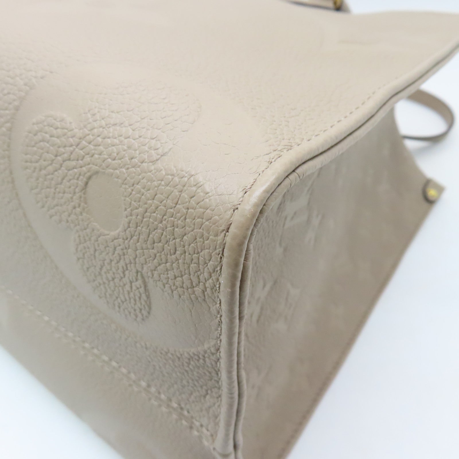 LOUIS VUITTON 【激減優惠】Monogram Empreinte Giant On The Go MM金扣手挽袋米色