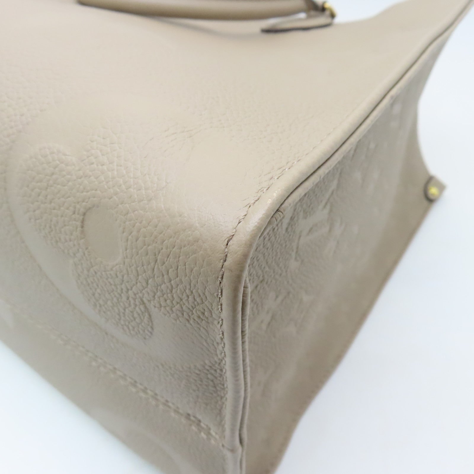 LOUIS VUITTON 【激減優惠】Monogram Empreinte Giant On The Go MM金扣手挽袋米色