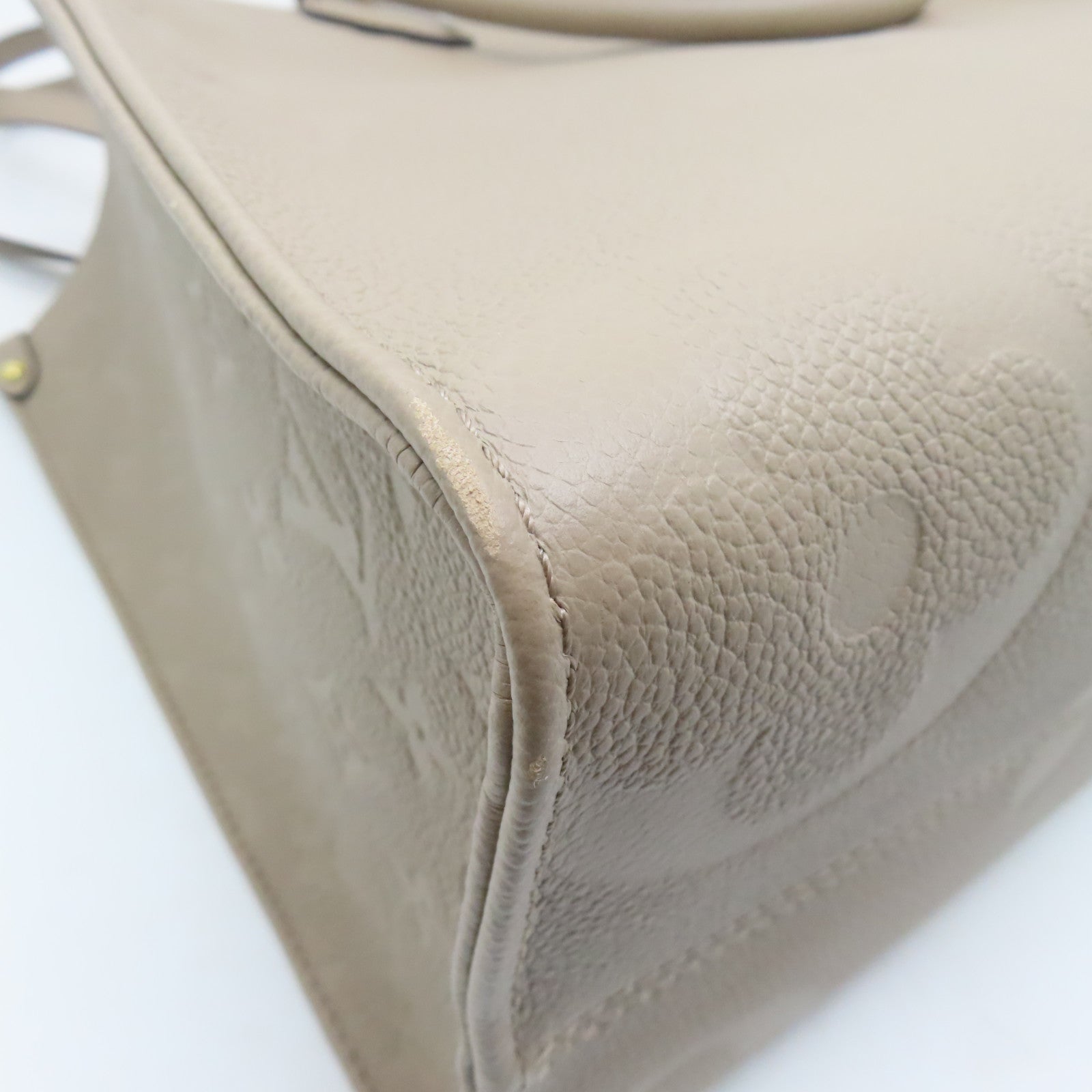 LOUIS VUITTON 【激減優惠】Monogram Empreinte Giant On The Go MM金扣手挽袋米色