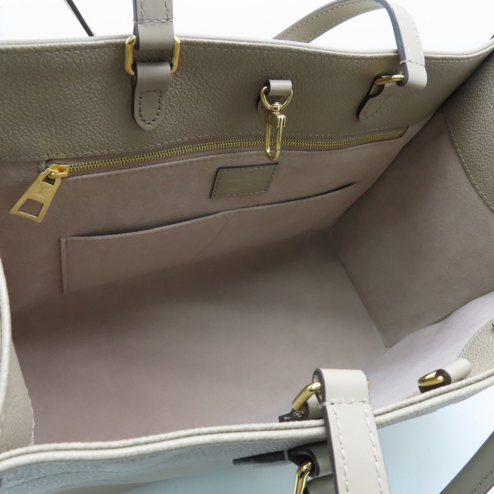 LOUIS VUITTON 【激減優惠】Monogram Empreinte Giant On The Go MM金扣手挽袋米色