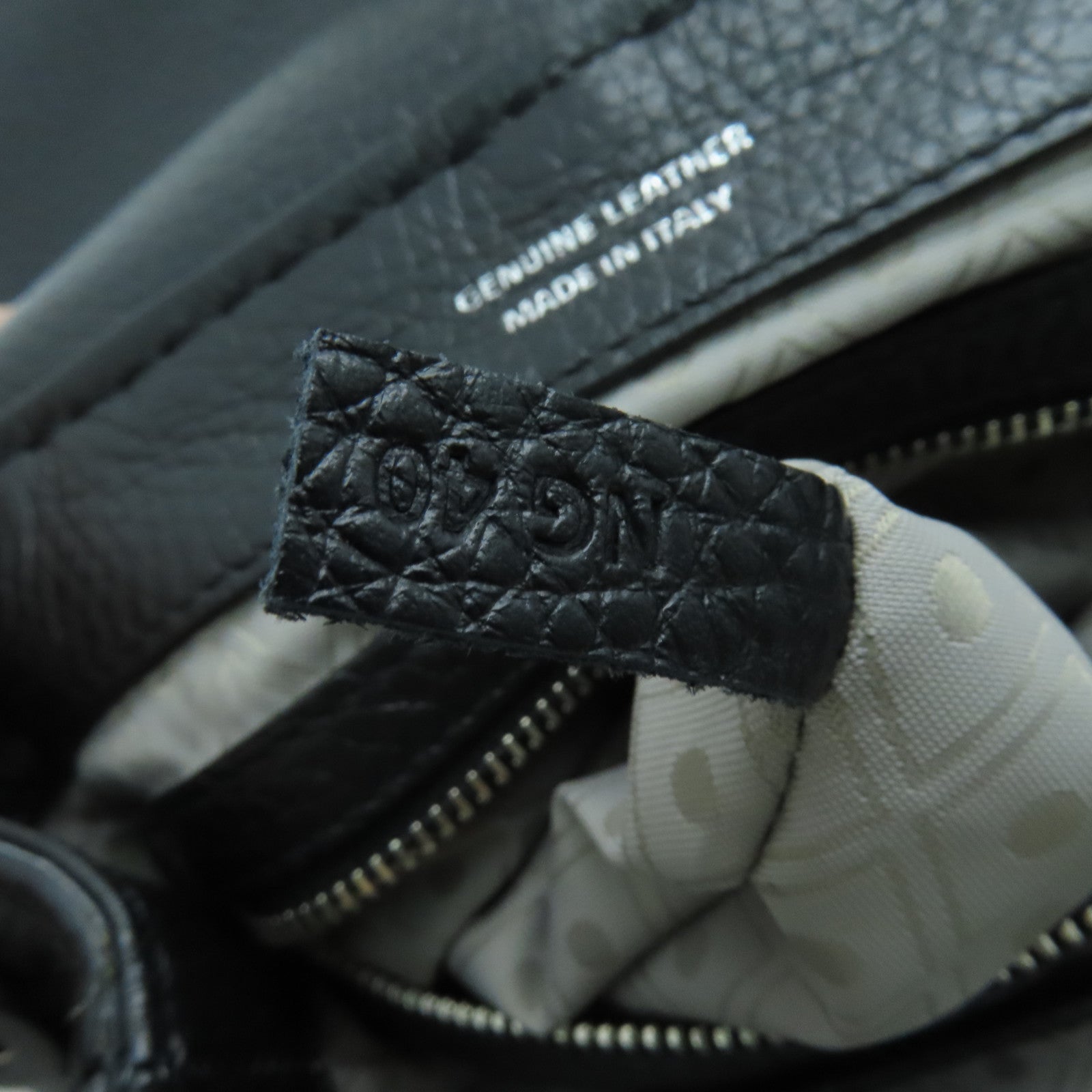 TOD’S 牛皮皮革Backpack銀扣背包黑色