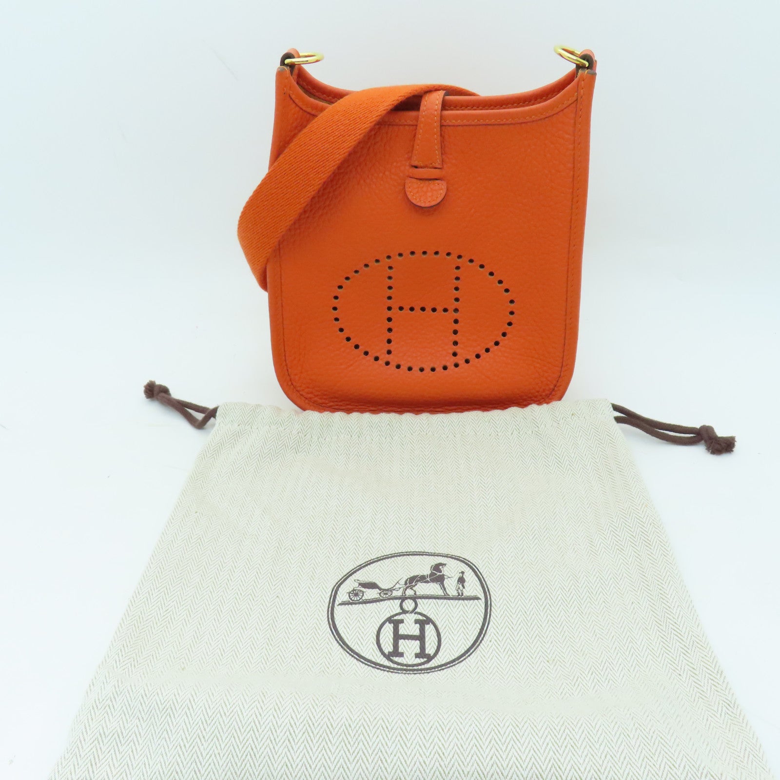 HERMES Clemence皮革Evelyne TPM金扣肩背袋火焰橘